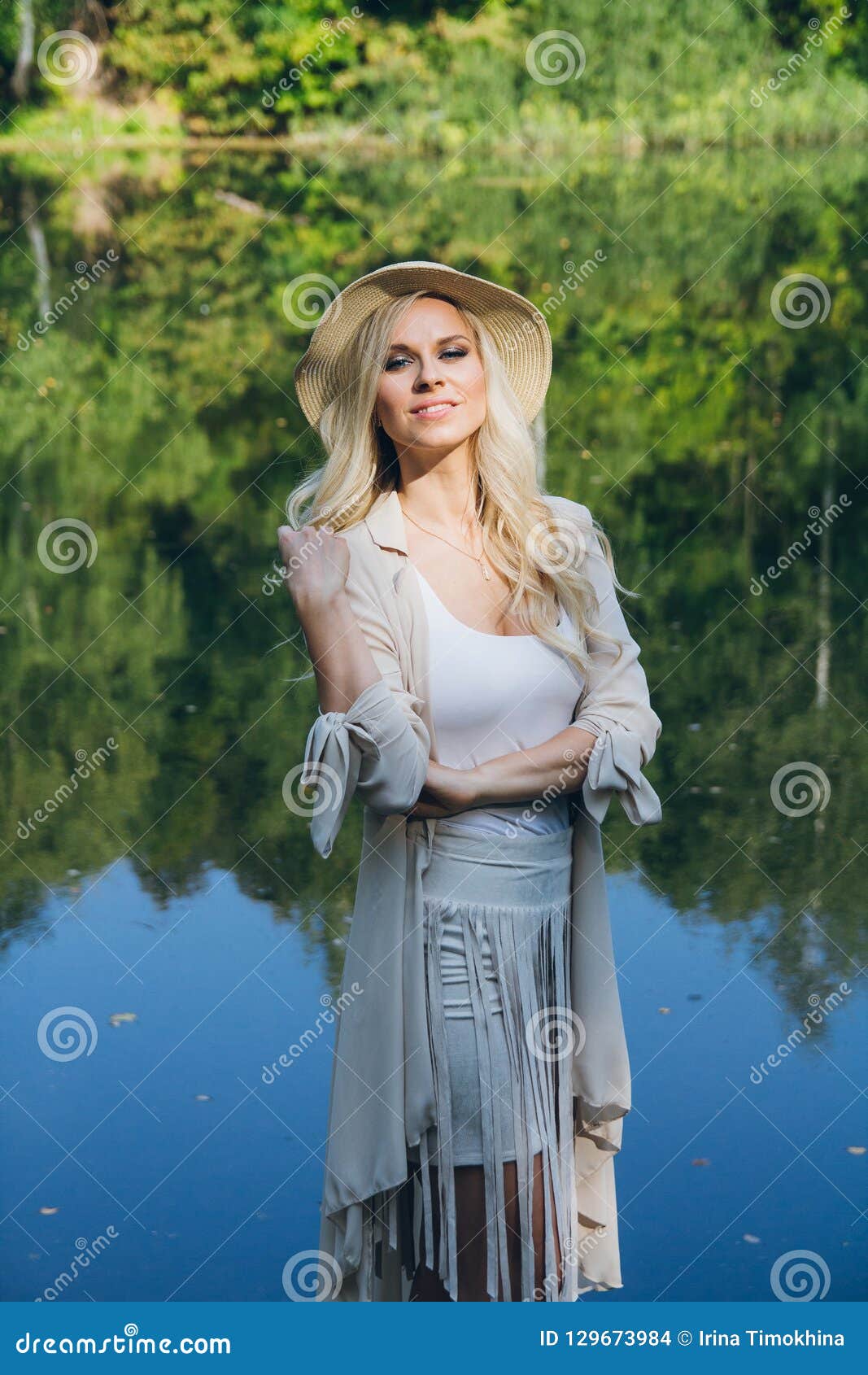 Girl in a Hat Resting on the Autumn Lake on the Bridge Stock Photo ...