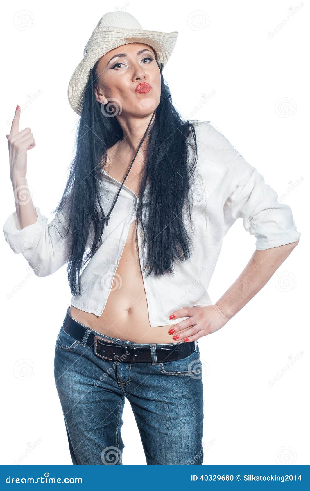 Girl in a hat showing thumb up. Girl in white hat shows his index finger upwards.
