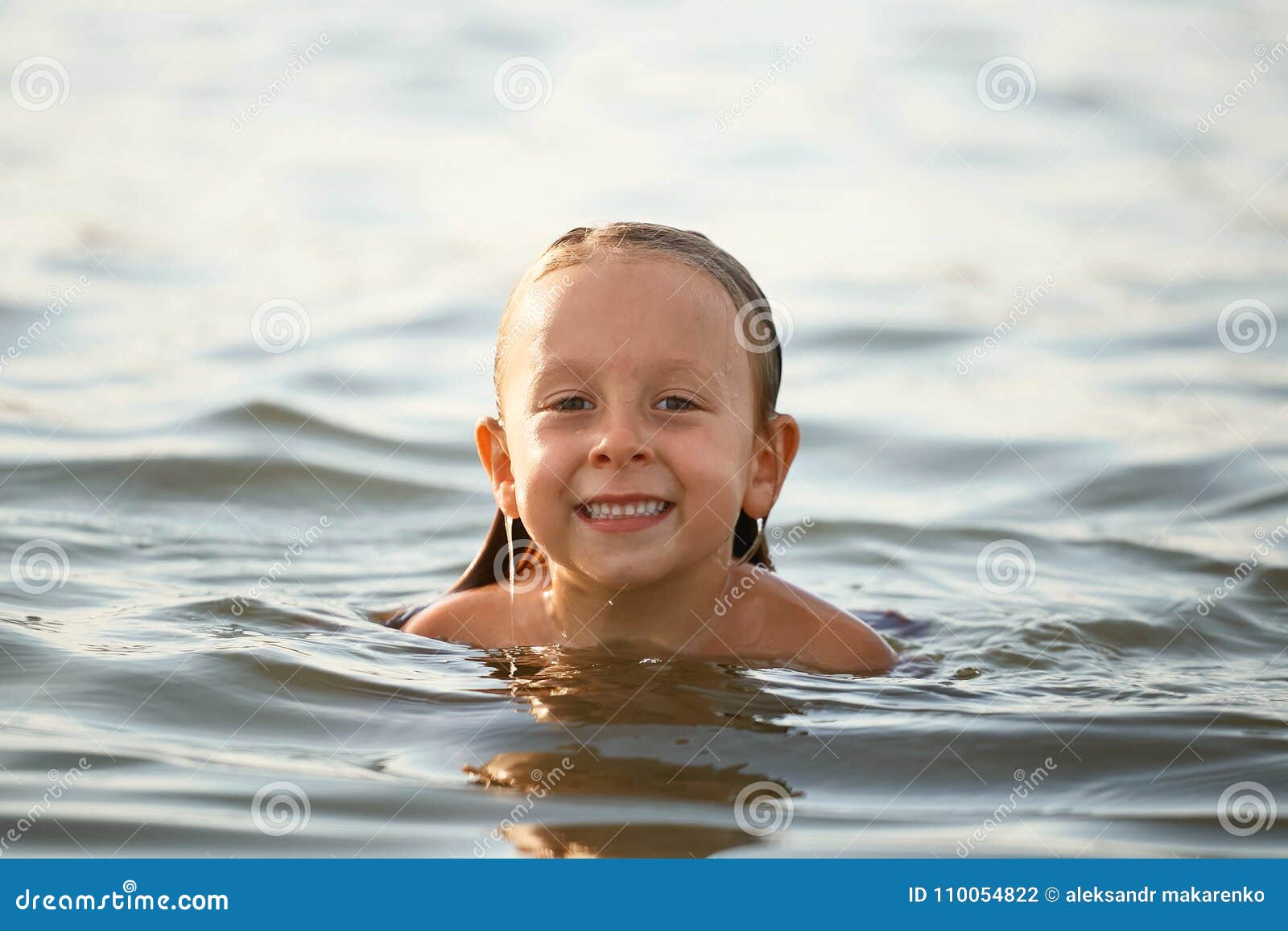 Girl Having Fun Bathing in the Sea. Stock Photo - Image of family ...