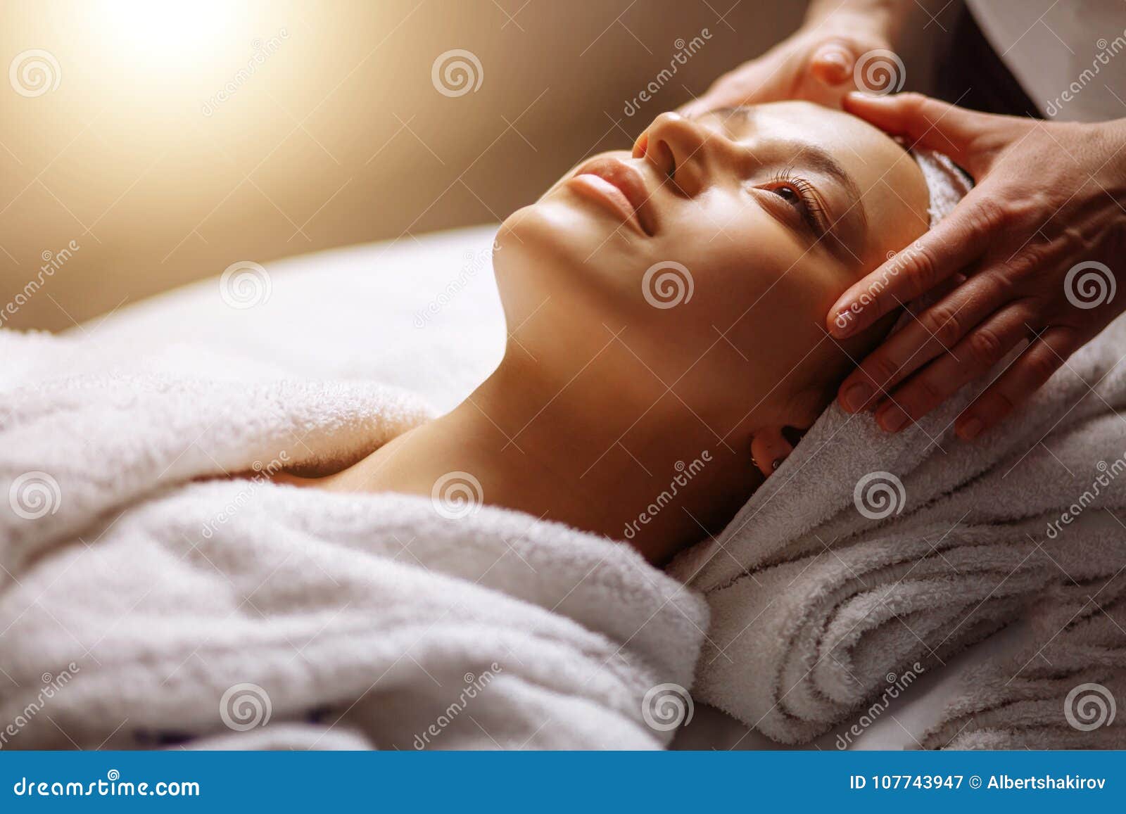 Girl Having Spa Facial Massage In Luxurious Beauty Salon Stock Image