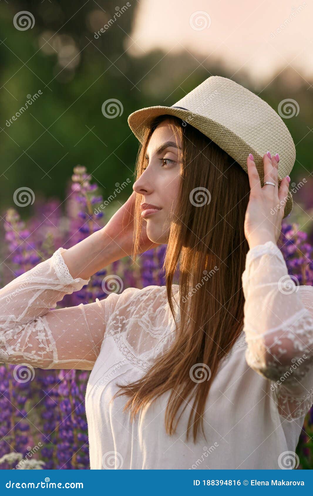 Girl with Her Hair Looks at the Setting Sun. Stock Photo - Image of front,  grass: 188394816