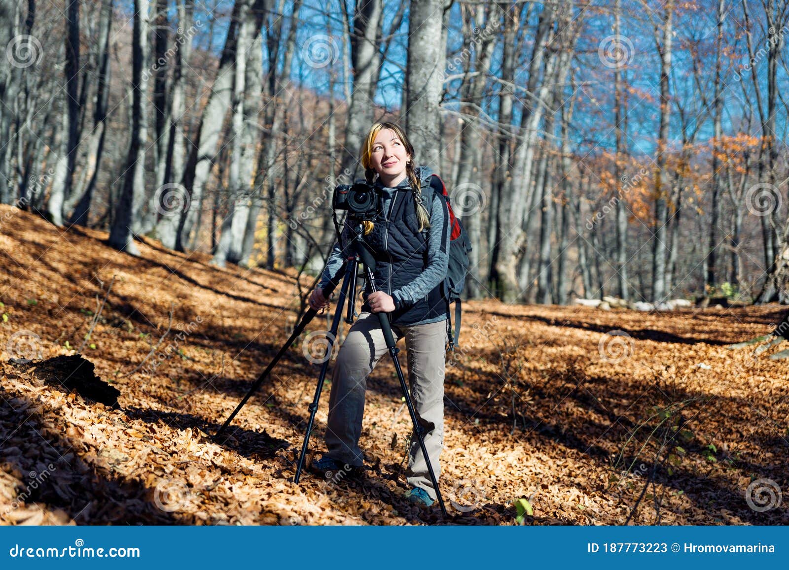 A Girl in Hiking Clothes Photographs Landscapes in the Mountains through an  Autumn Beech Forest Stock Image - Image of hike, fall: 187773223