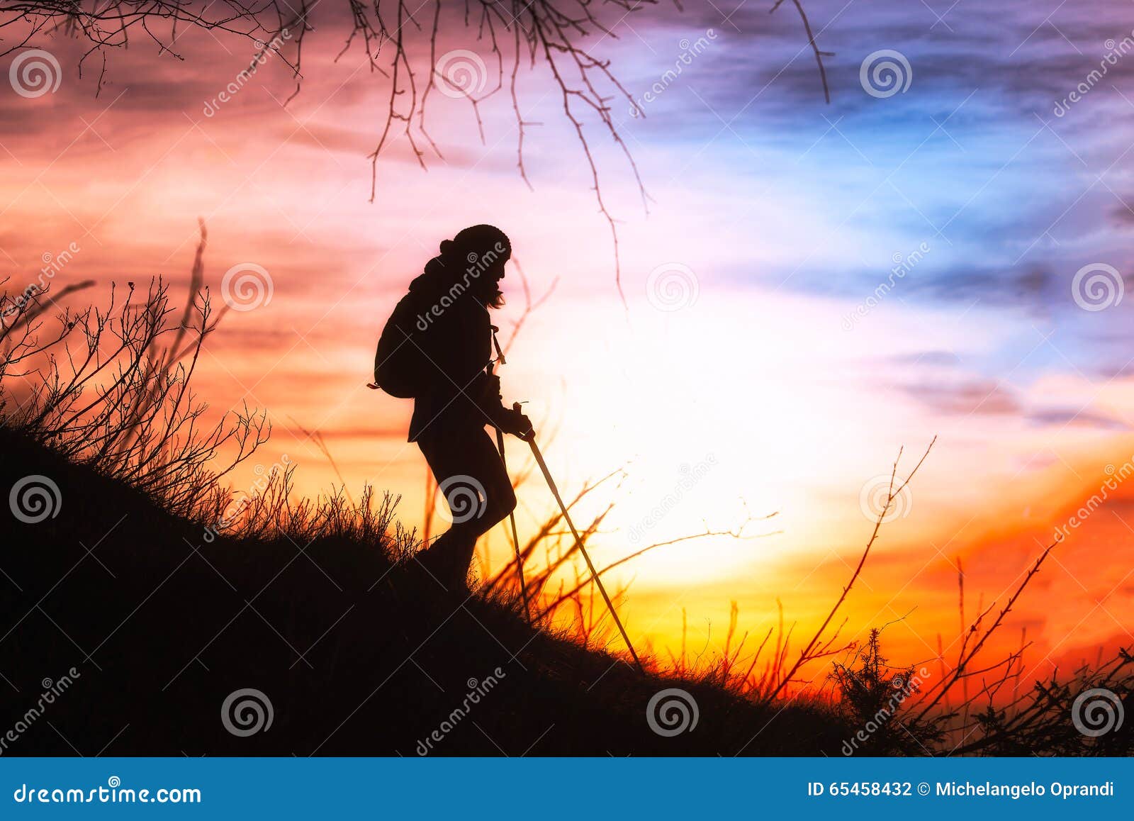 Girl hiking in silhouette stock photo. Image of people 65458432