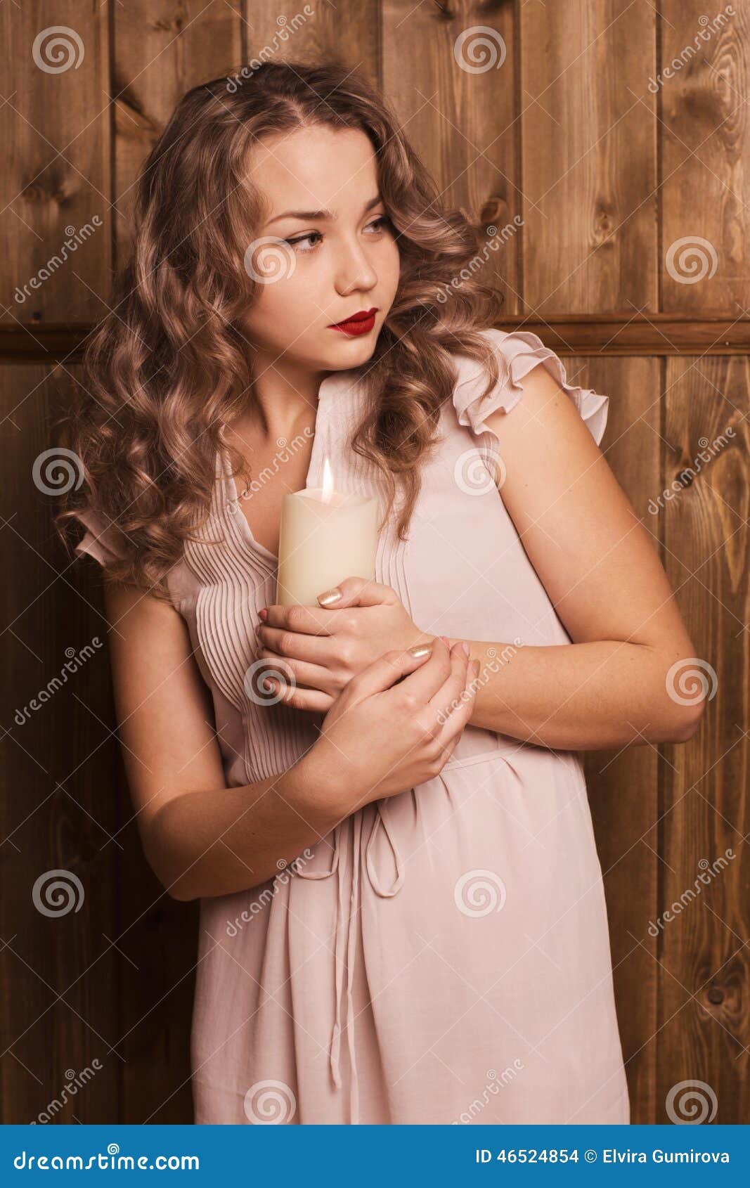 Girl holding a candle stock photo. Image of chair, attractive 46524854