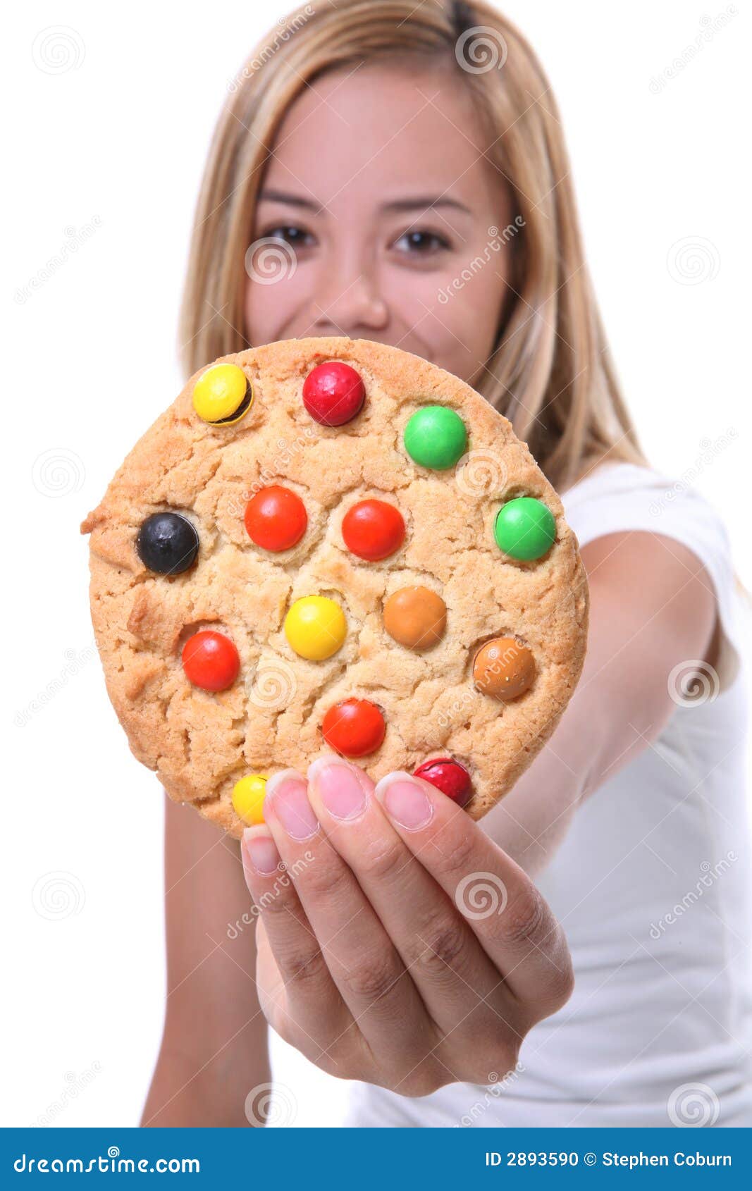 Girl Holding Cookie stock photo. Image of hand, hungry 2893590