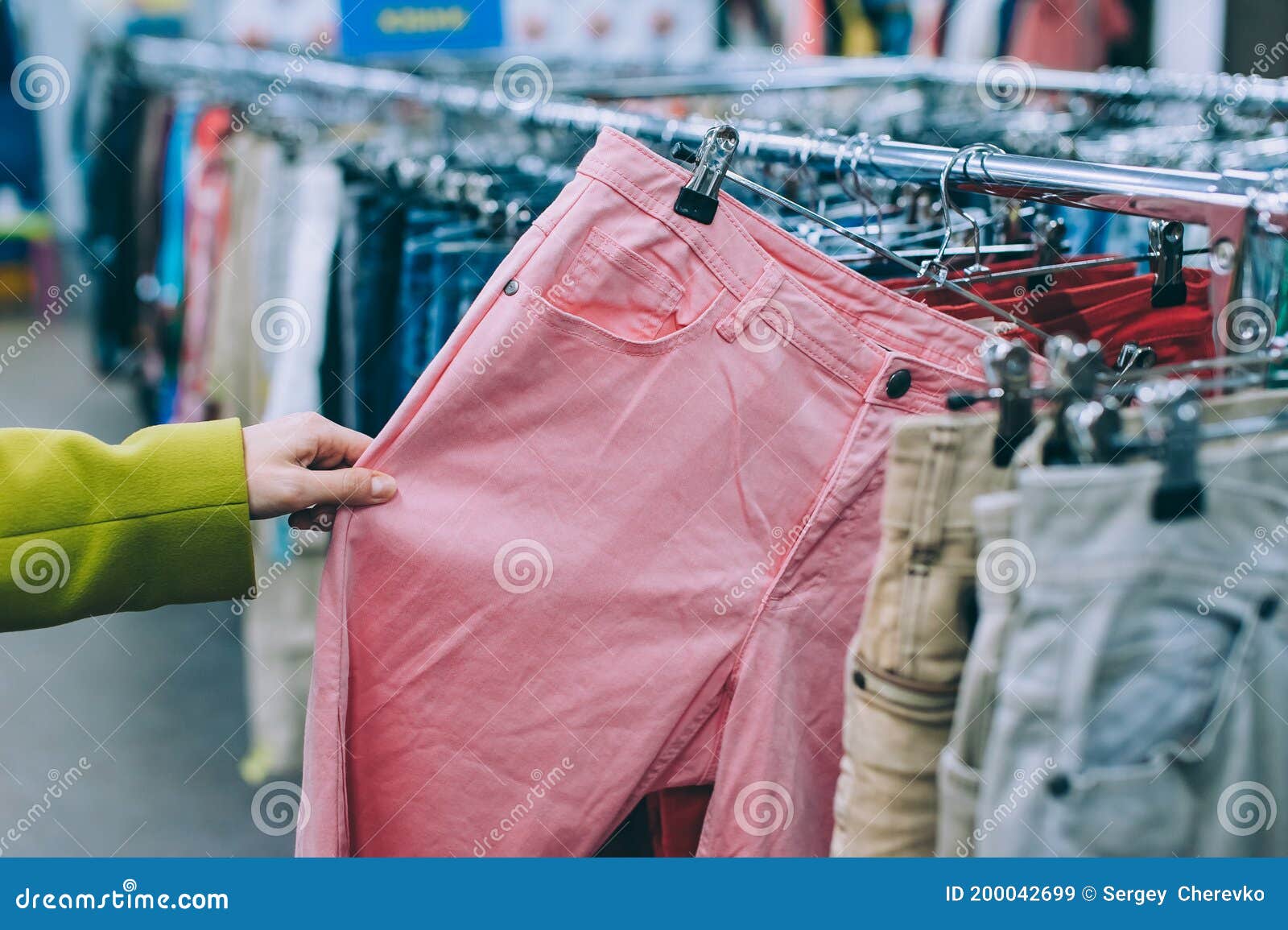 Girl Holding Pants in the Hands in the Supermarket Stock Image Image