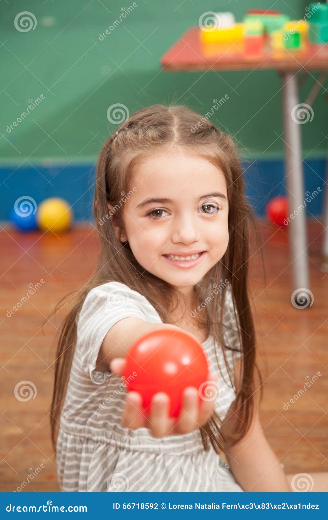 Girl Holding a Plastic Ball Stock Photo Image of model, caucasian