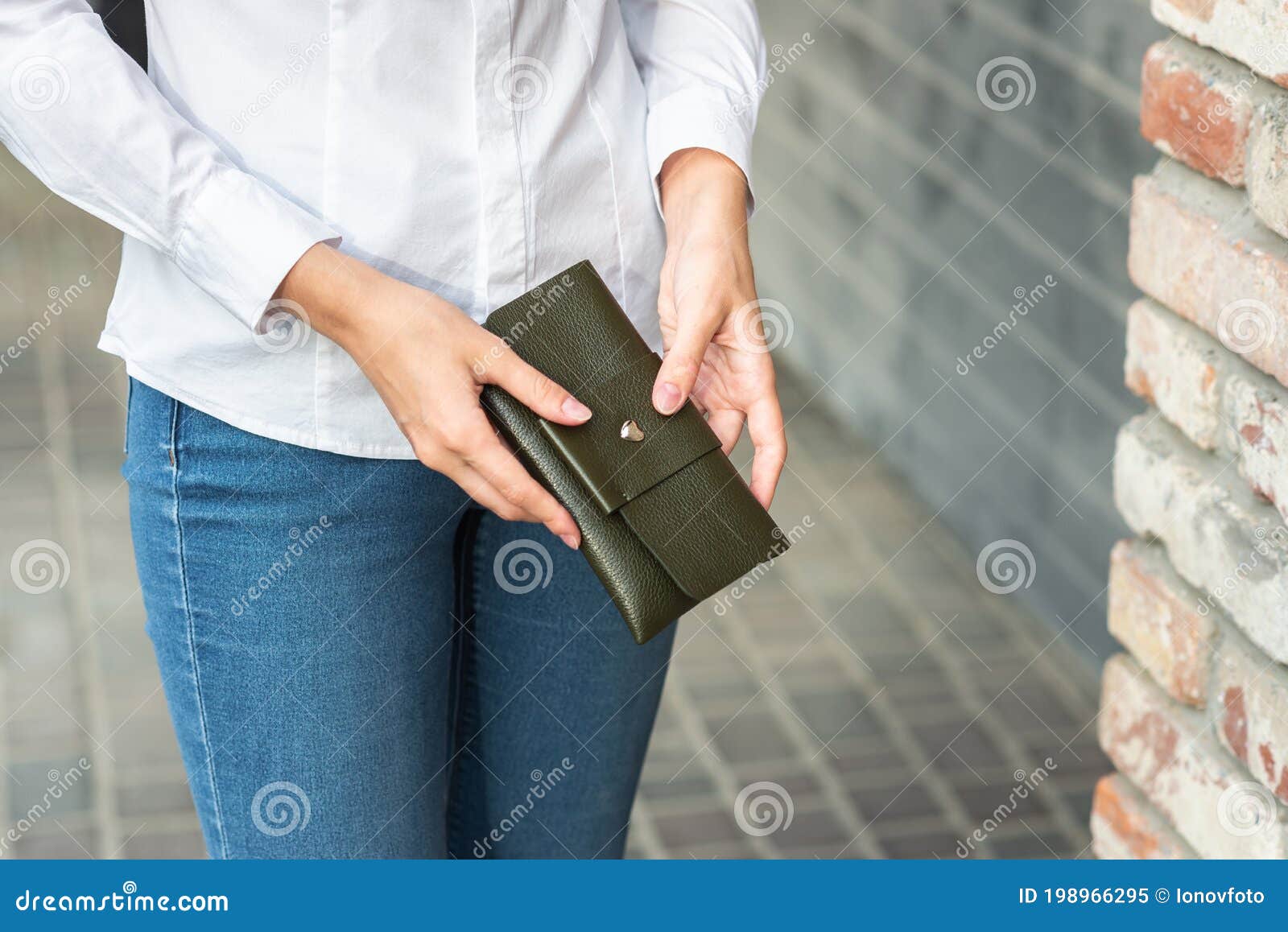 A Girl Holding a Purse in Her Hand Stock Image Image of purse, body