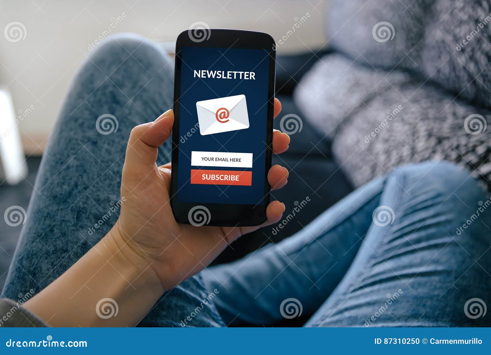 girl holding smart phone with subscribe newsletter concept on sc