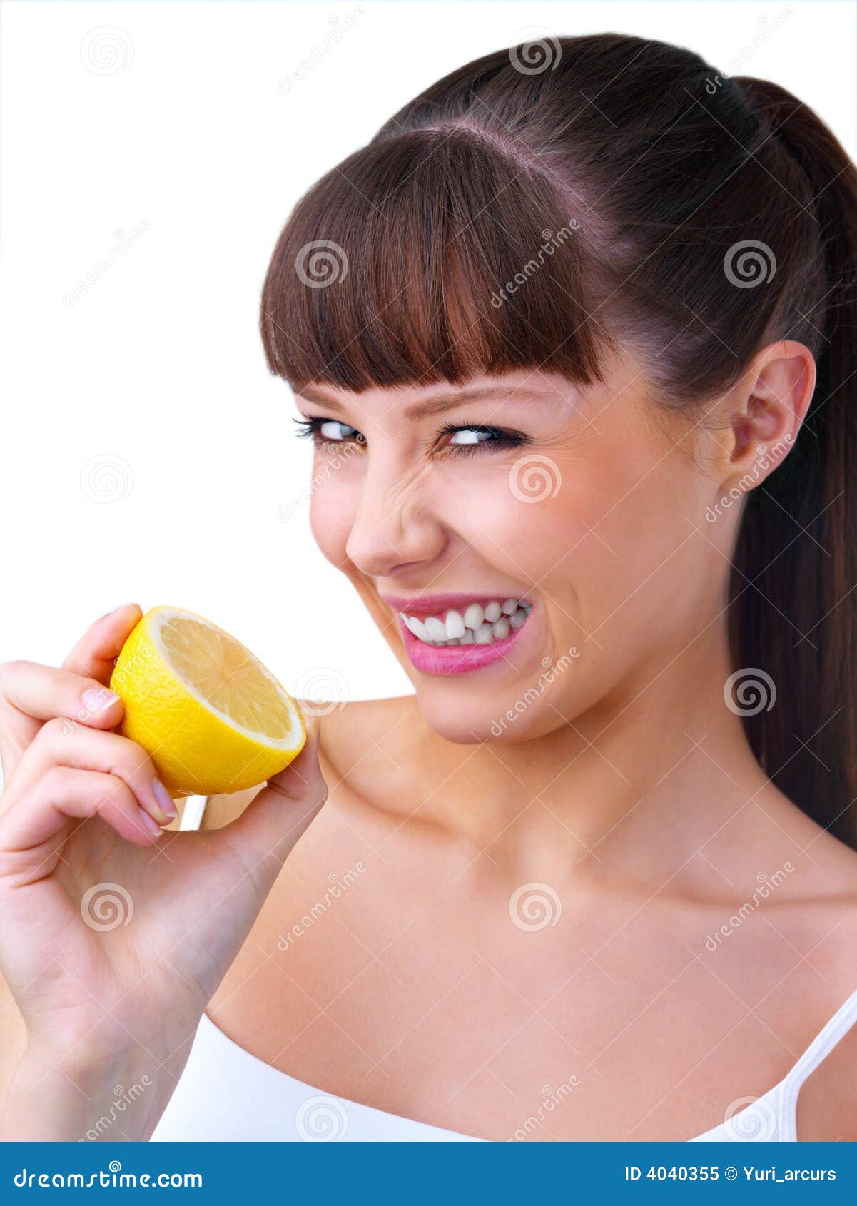 Girl holding a sour lemon stock image. Image of healthy 4040355