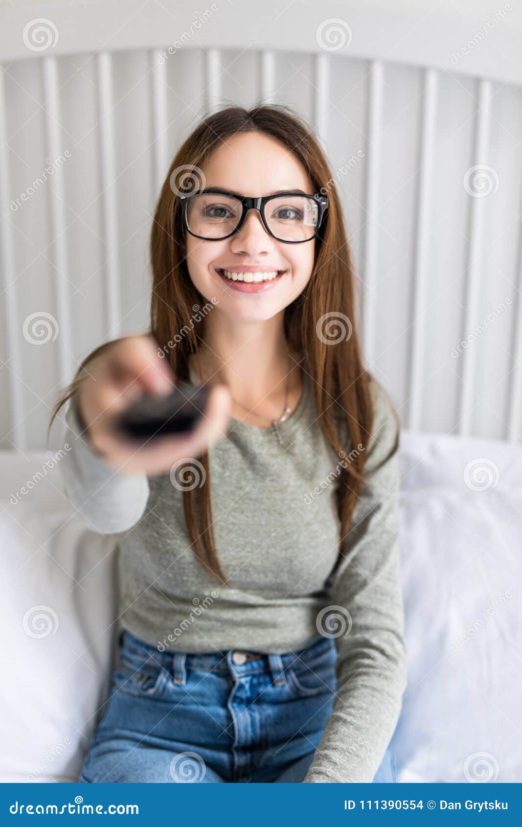 Girl Holding A TV Remote Chang