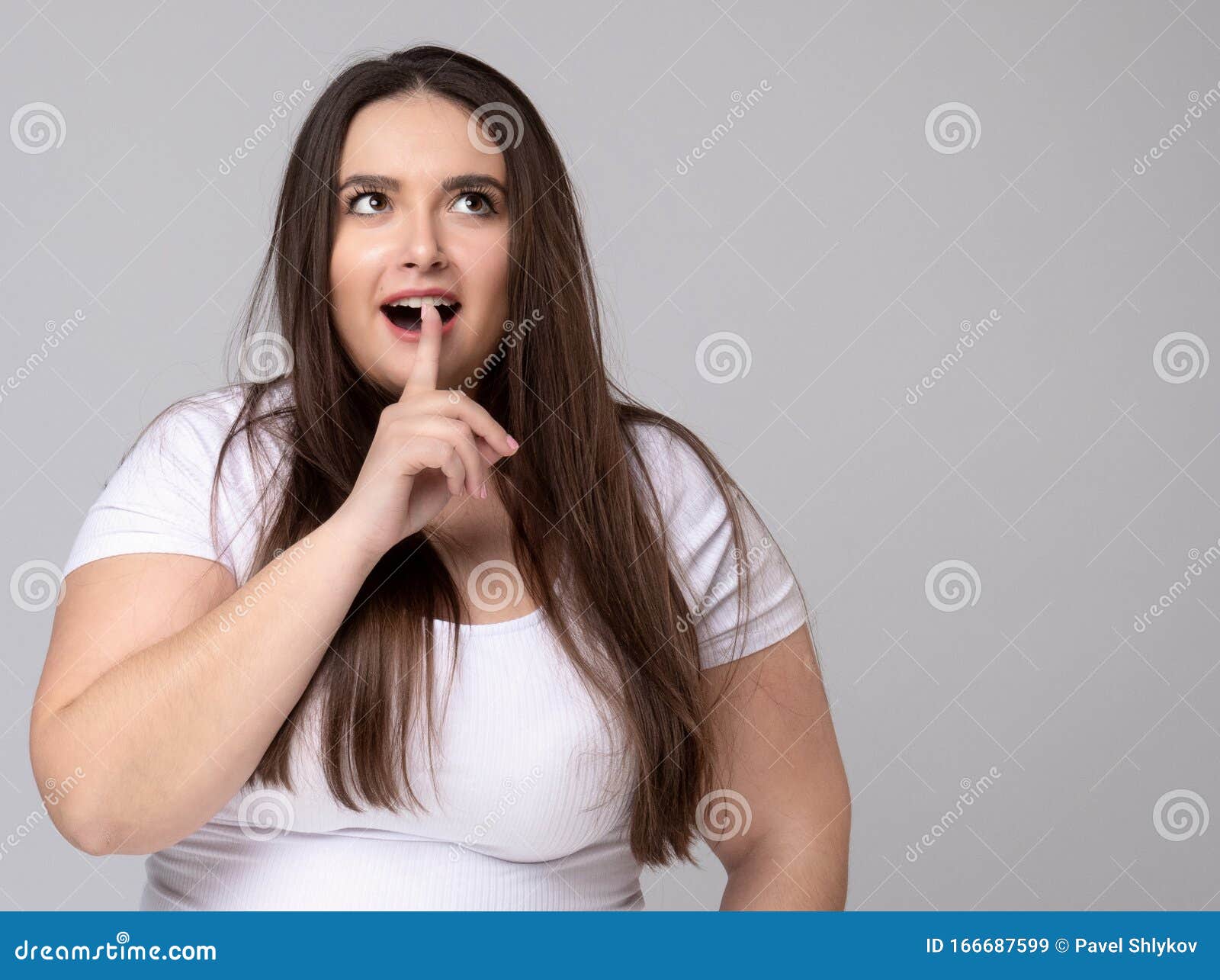 Girl Holds Finger At Mouth Urging To Keep Silence Stock Image Image
