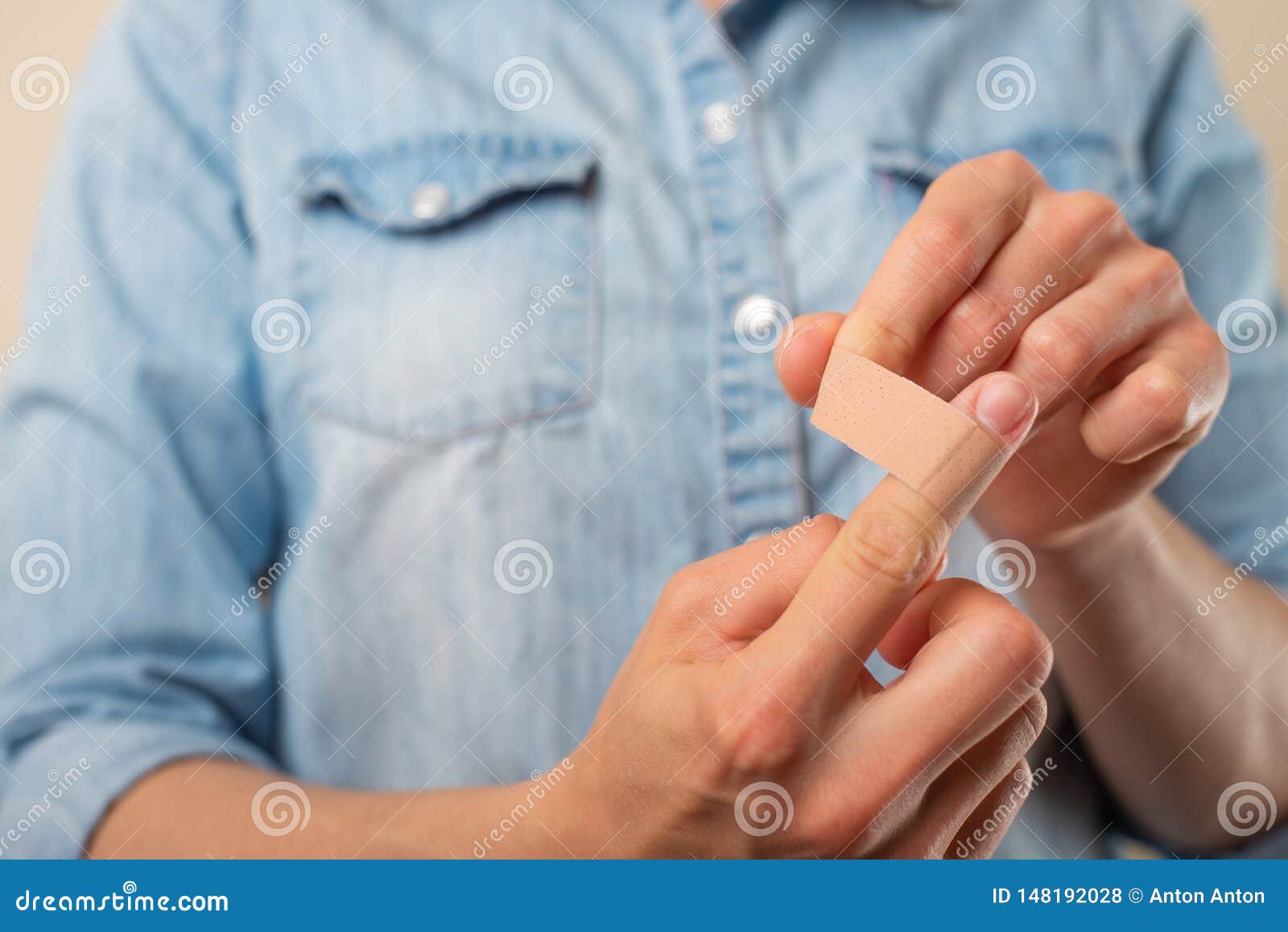 the girl holds and glues the patch on the hand, on the wound, treatment, throwing while smoking