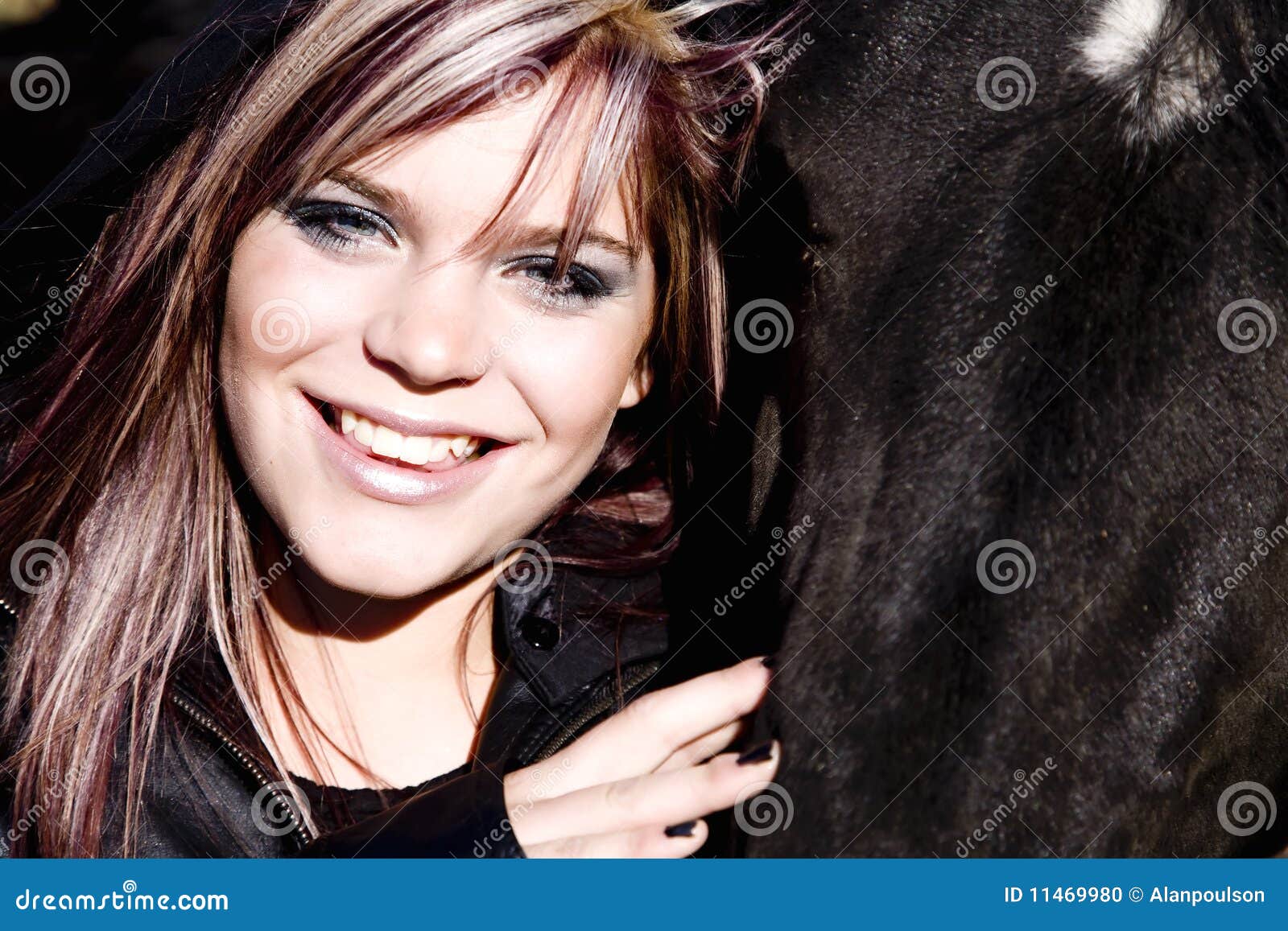 Girl and horse faces stock photo. Image of hoody, animal 11469980
