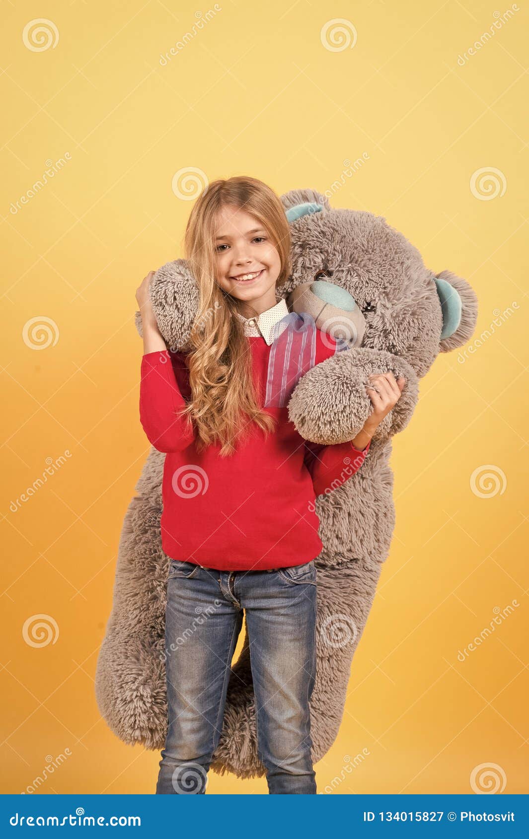 Girl Hug Big Teddy Bear on Orange Background Stock Image - Image of ...
