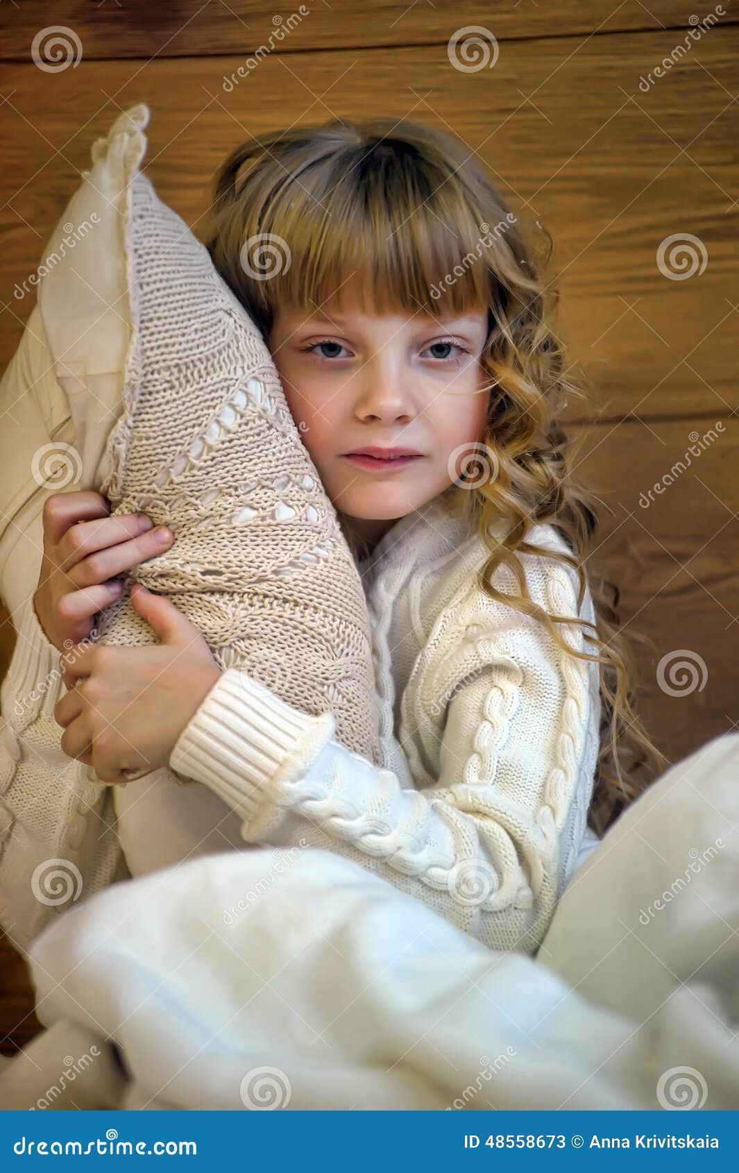 Girl hugging a pillow stock image. Image of bedding, hope 48558673