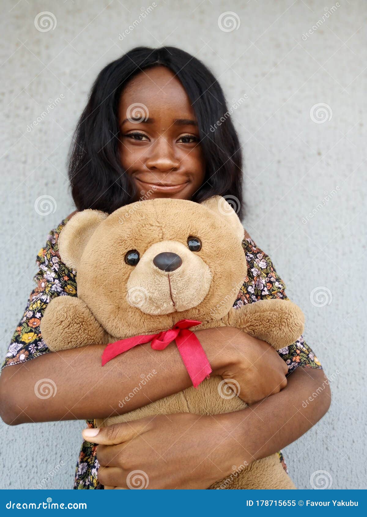 Girl Hugging Teddy Bear