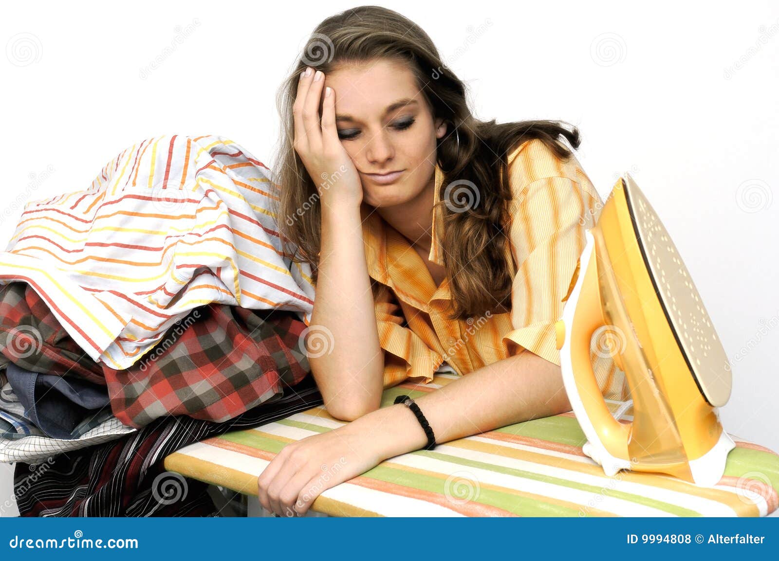 Girl at ironing board stock photo. Image of striking, young 9994808
