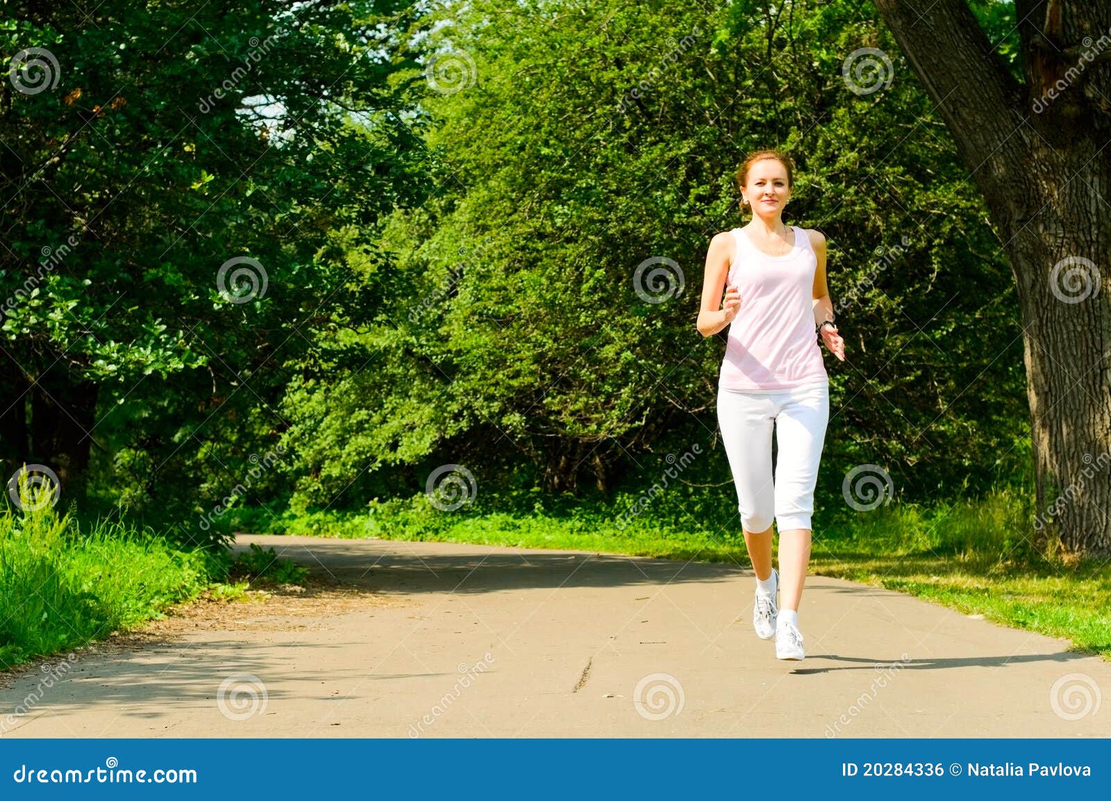 Girl jogging stock photo. Image of model, green, person 20284336