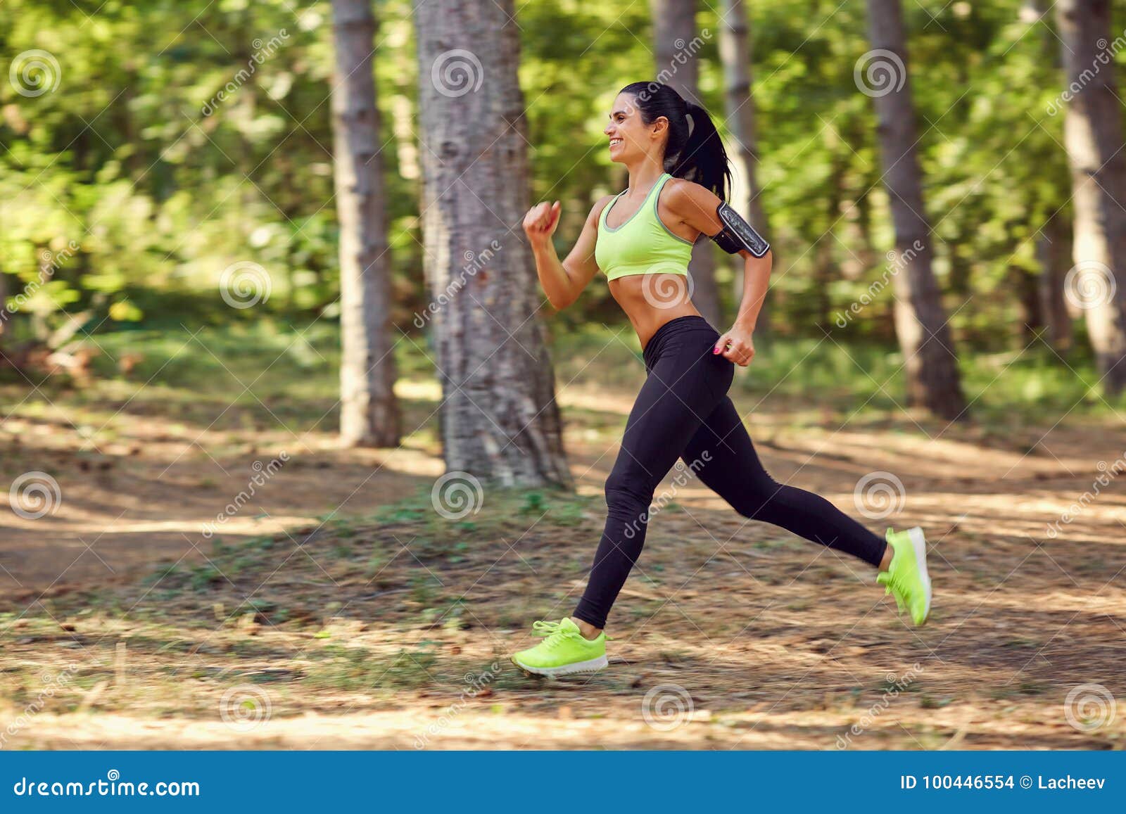 A Girl Jogging in the Woods Outdoors. Stock Photo - Image of woman ...