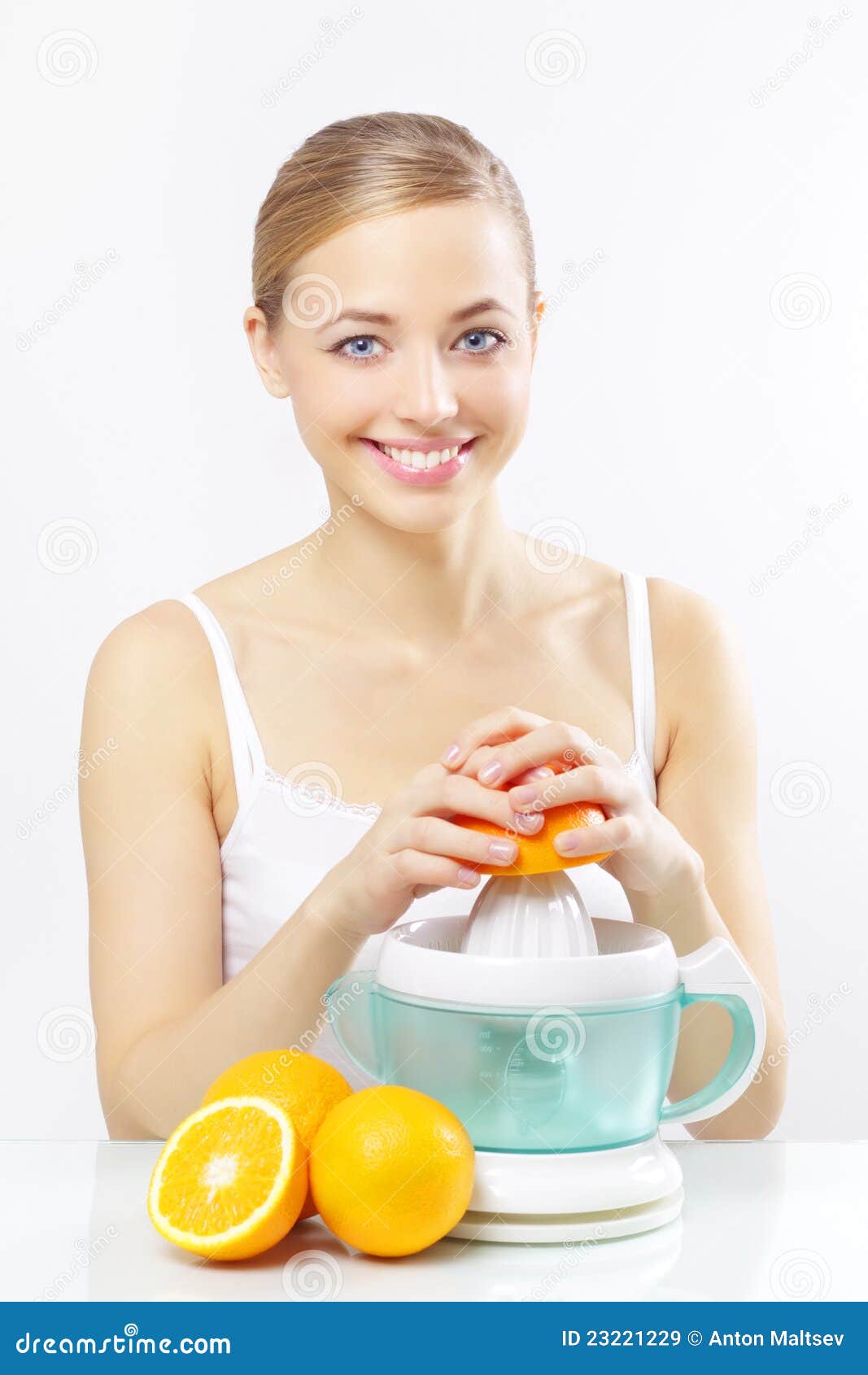 Girl with a Juicer and Oranges on a Gray Stock Image Image of
