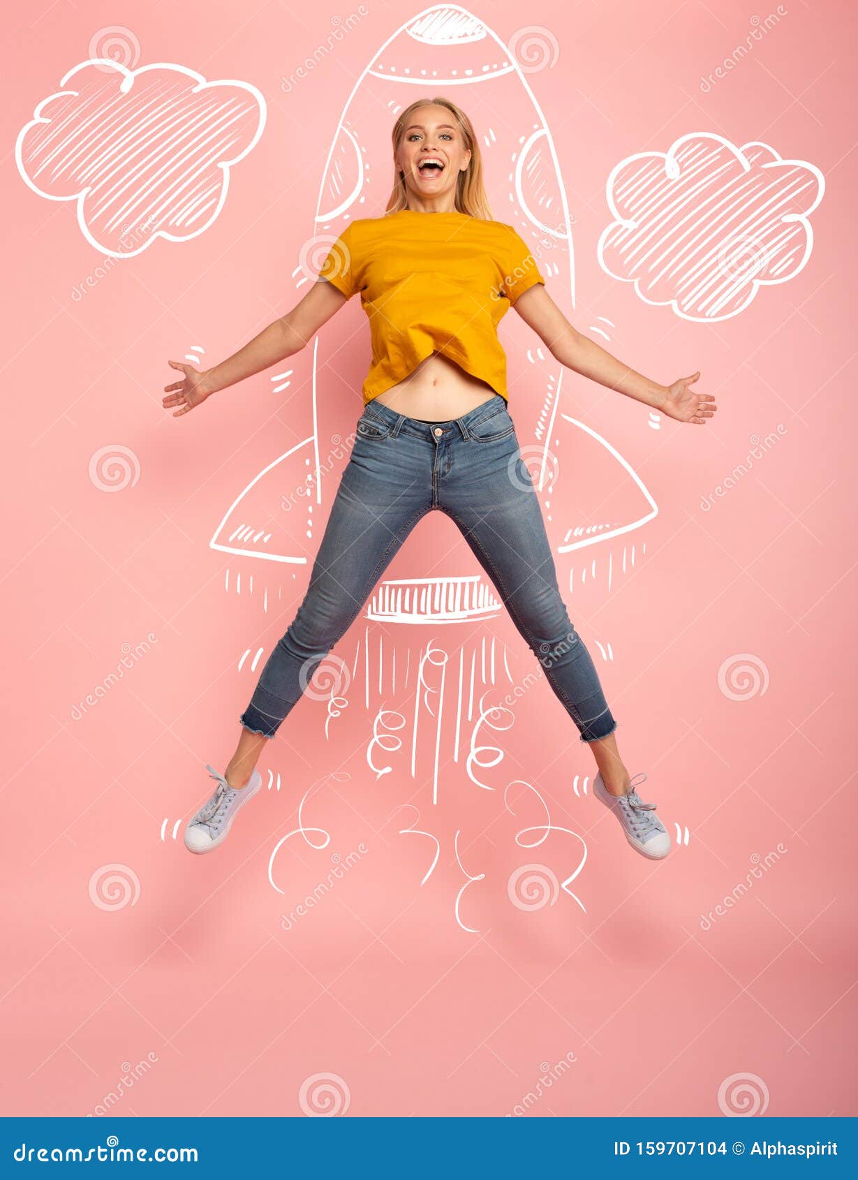 girl jumps on pink background ready to fly like a rocket. concept of freedom, energy and vitality