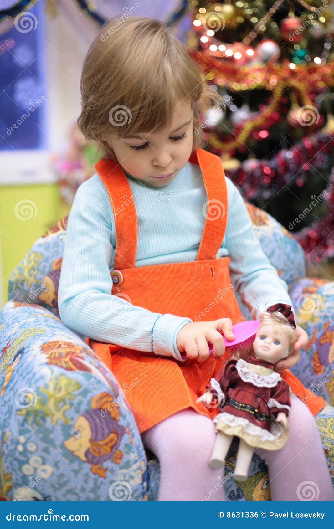 Girl in Kindergarten with Doll Stock Photo Image of interest, doll