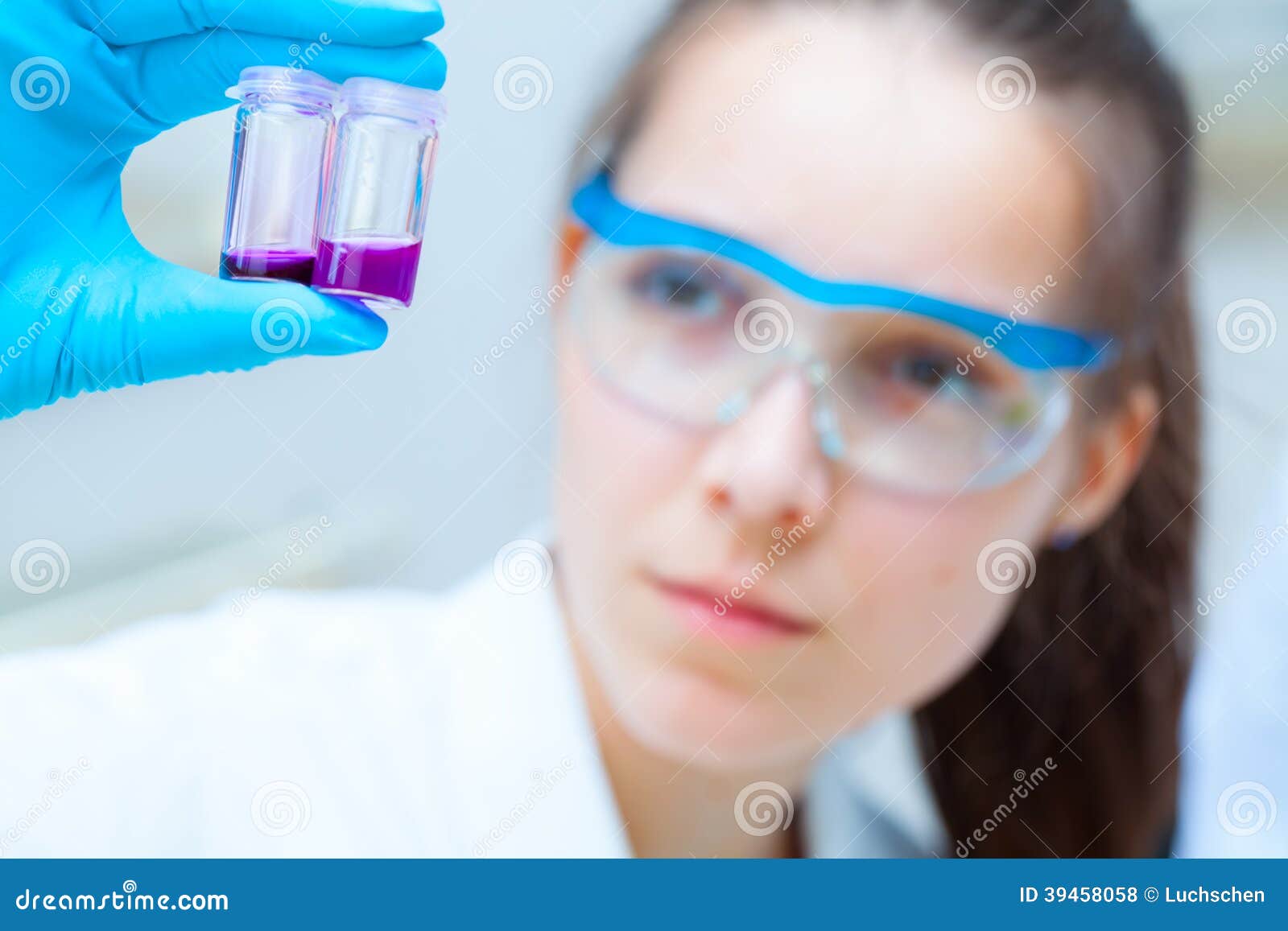 Girl Laboratory Assistant Checks Samples in Medical Lab Stock Photo