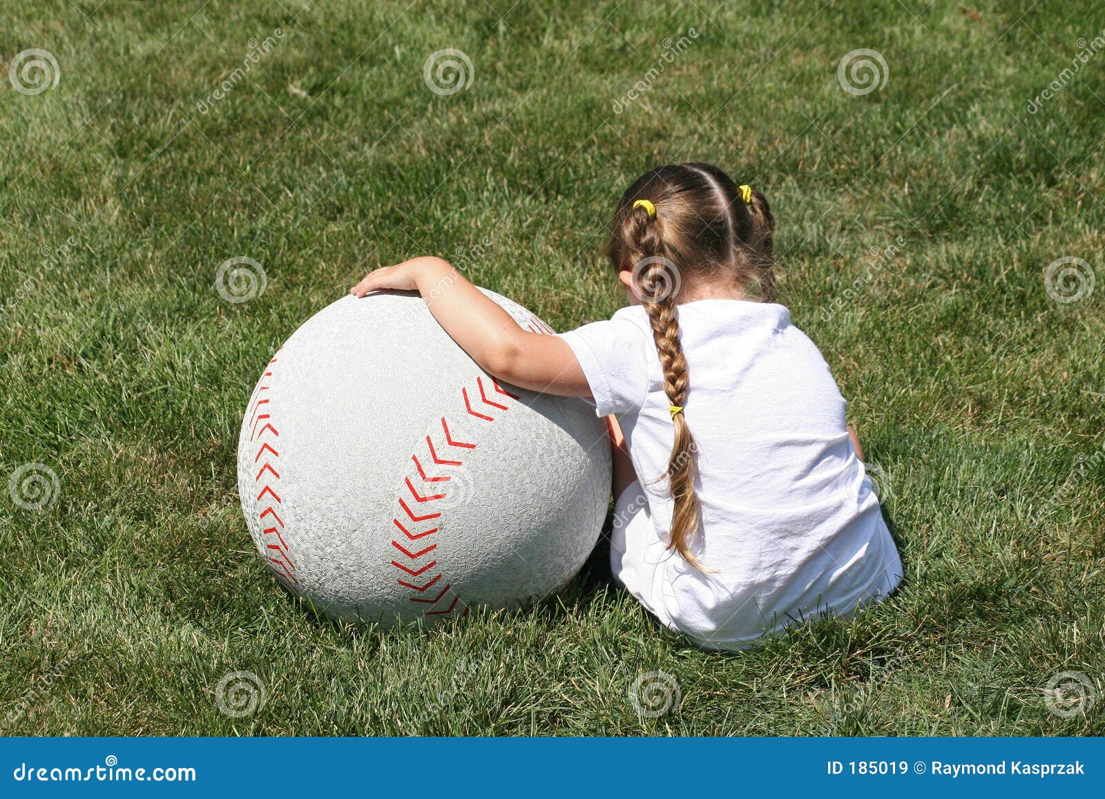 Girl and Large Baseball stock image. Image of green, girl 185019
