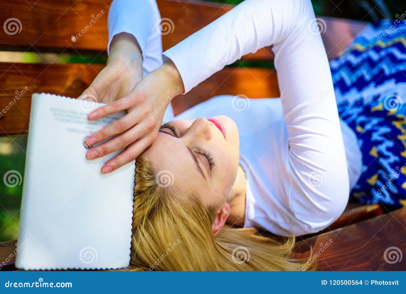 girl lay bench relaxing with book green nature background need