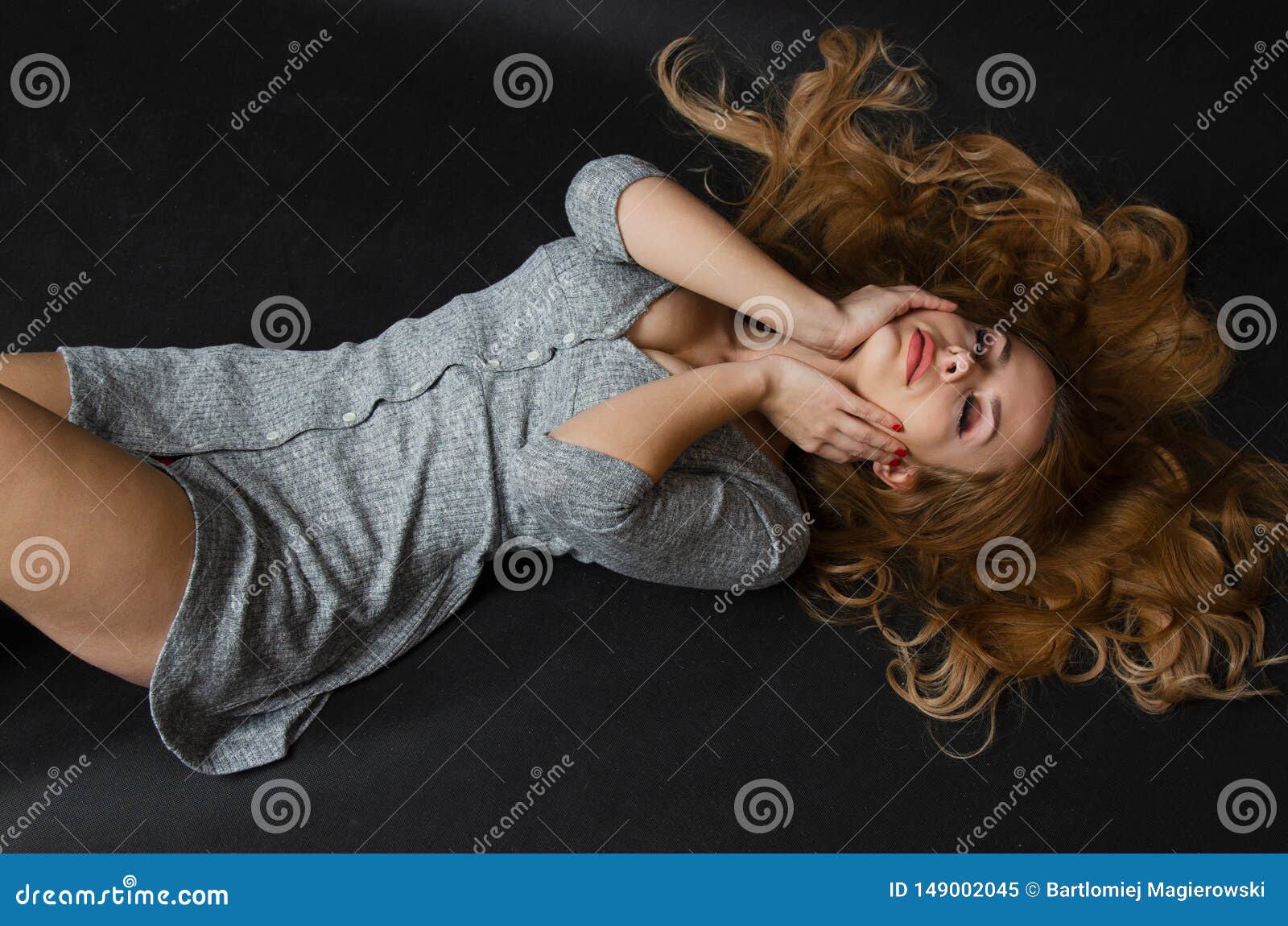 Girl Laying on Ground with Black Background Stock Image - Image of poland,  youth: 149002045