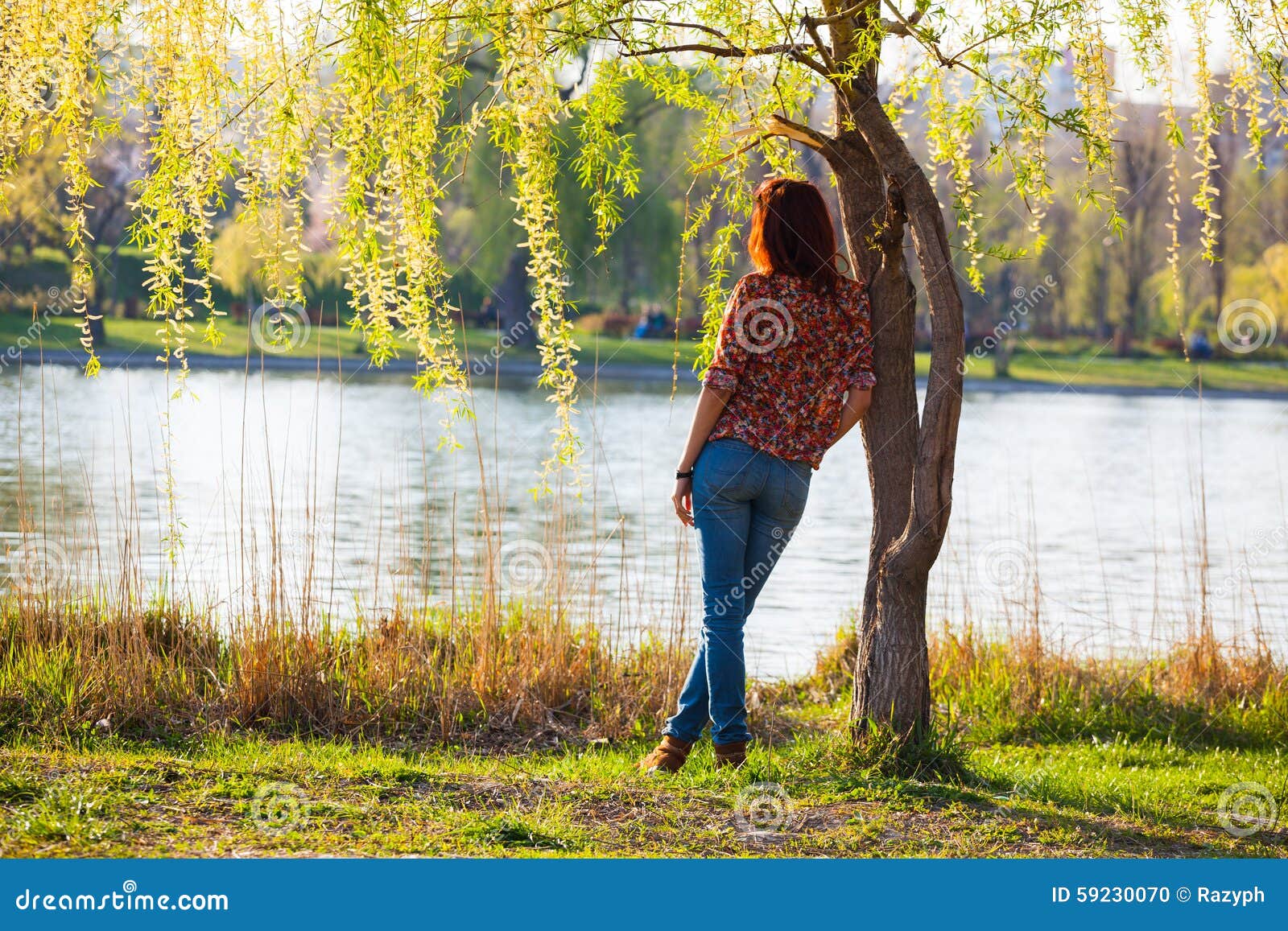 Girl Leaning Against a Tree, Pensive Stock Photo - Image of outdoors ...