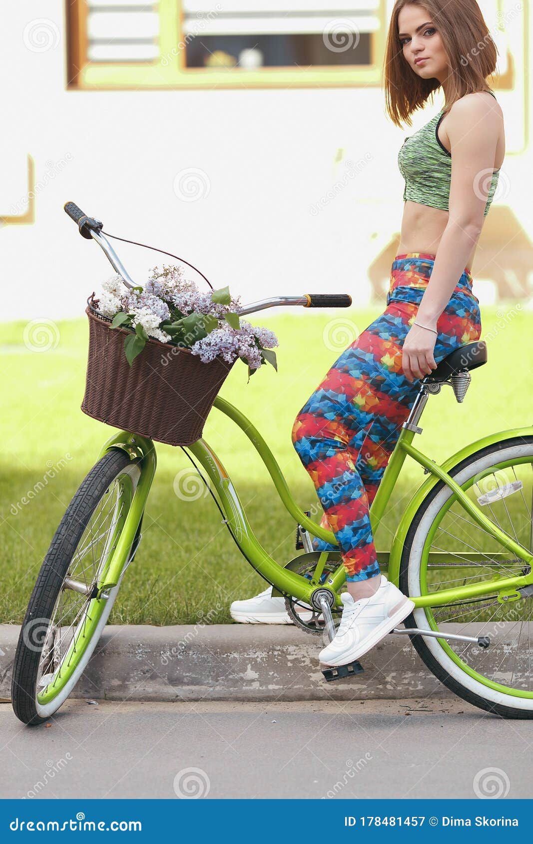 The Girl in Leggings and Top Engaged in Sports Cycling. Spring Stock Image  - Image of blue, green: 178481457