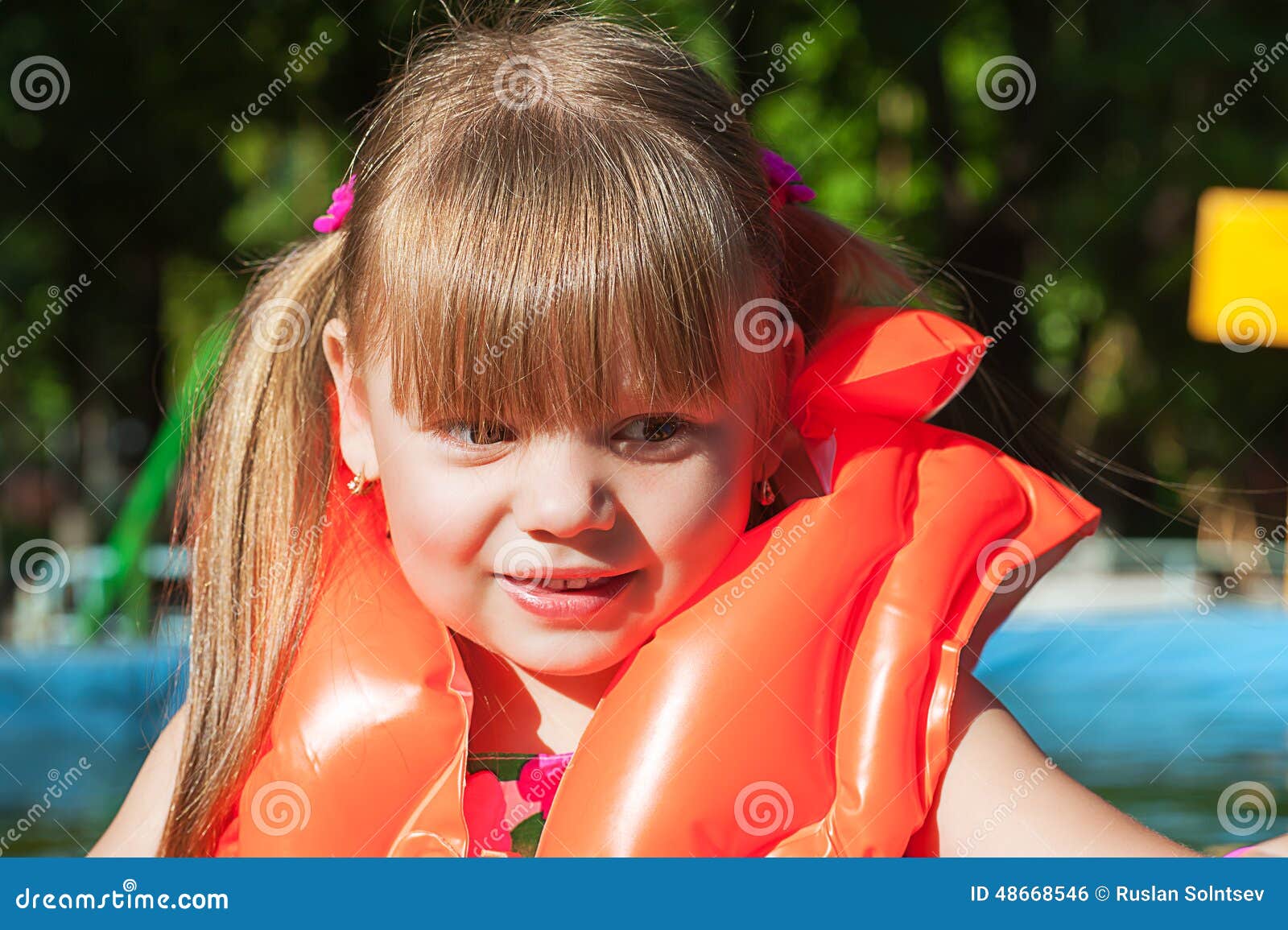 Girl in a Life Jacket Smiling Stock Photo Image of closeup, swimming