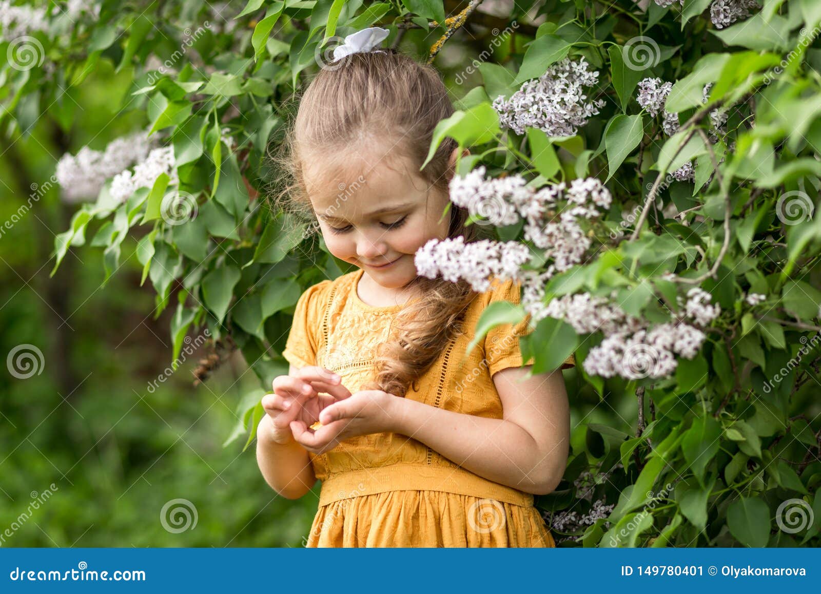 Girl and Lilac Flowers in the Garden in Summer Stock Image - Image of ...