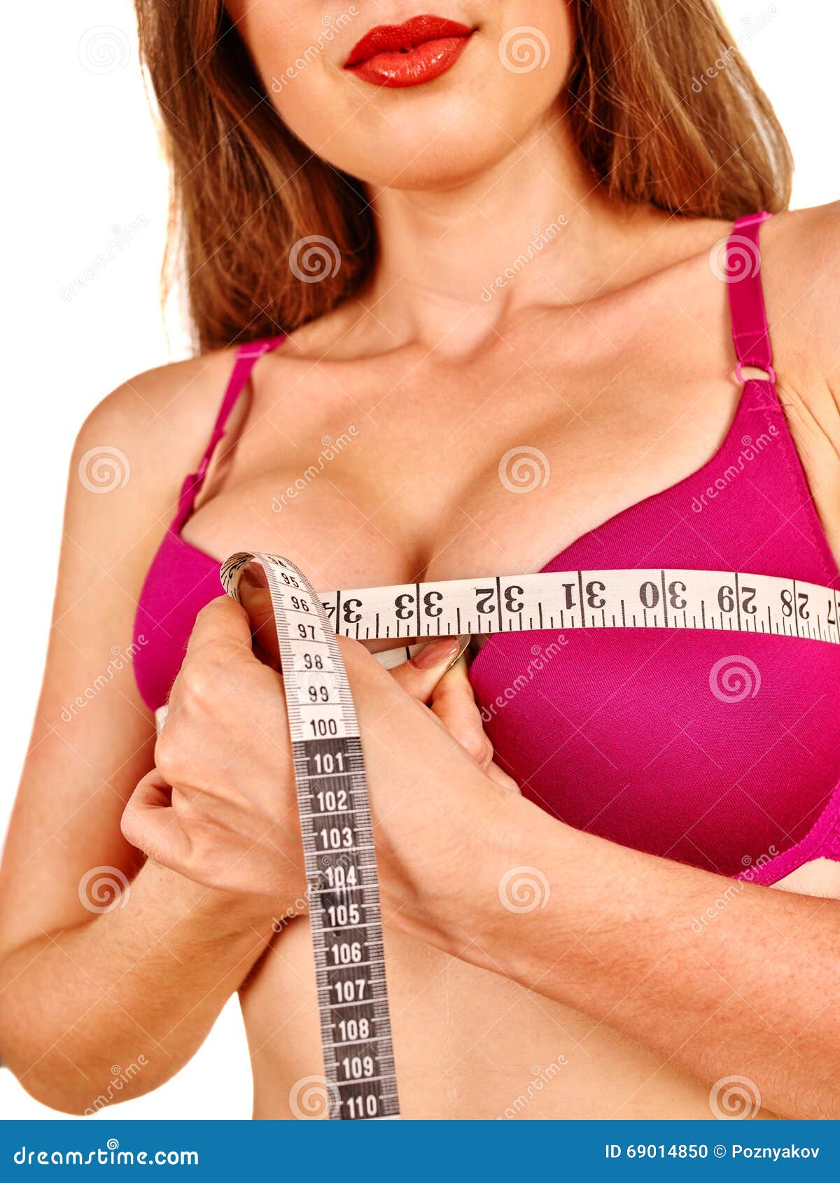 Girl in Lingerie Measures Her Breast Measuring Tape. Stock Photo