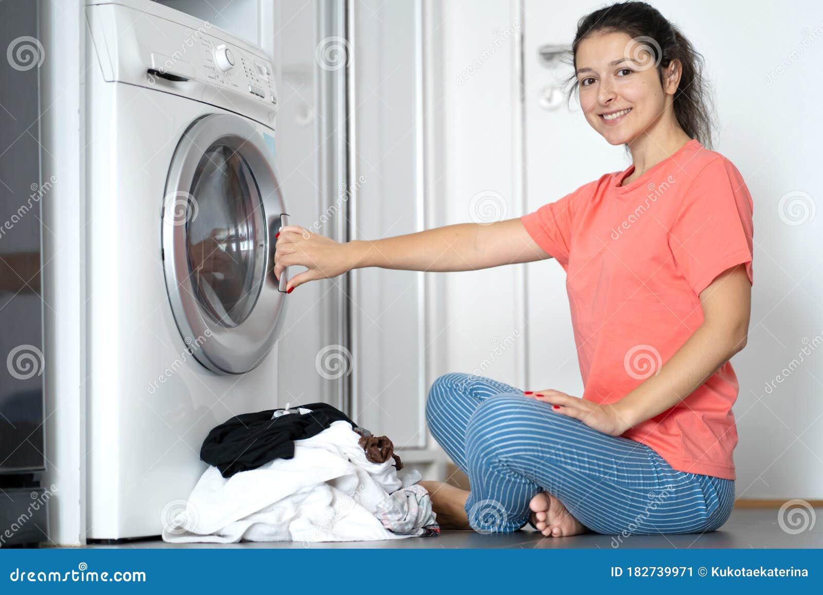 Girl Sitting On Washing Machine