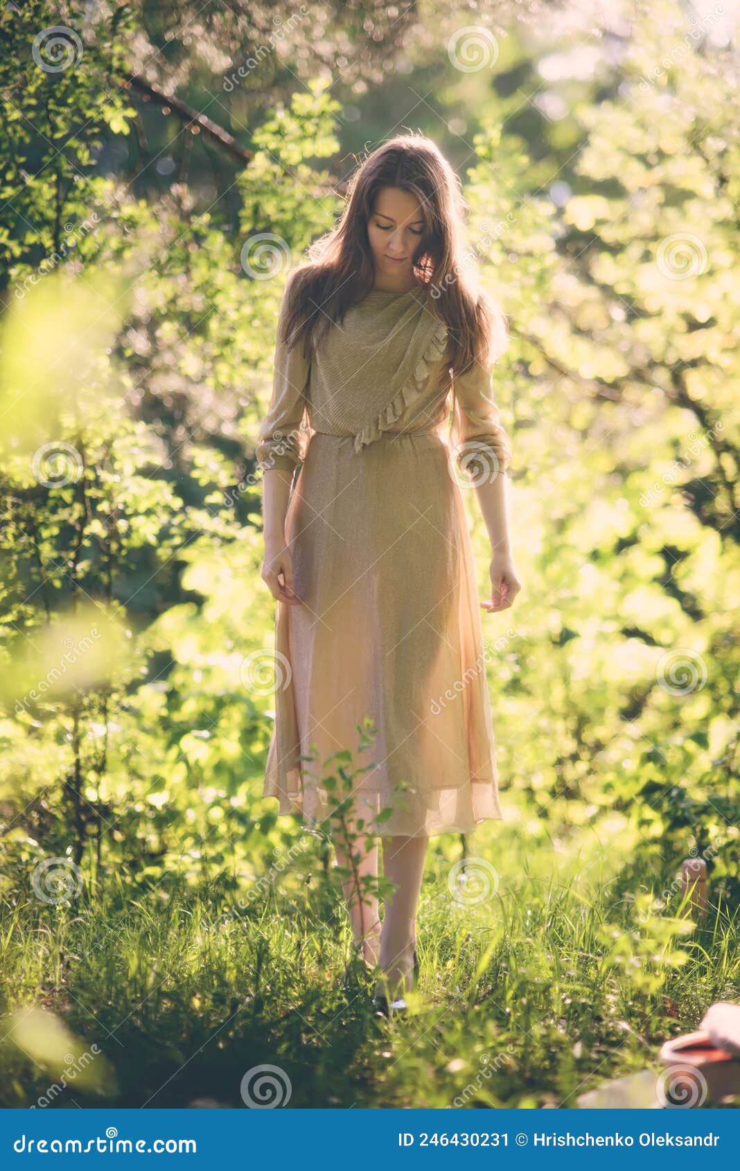 girl in a long dress in the sun. post processing