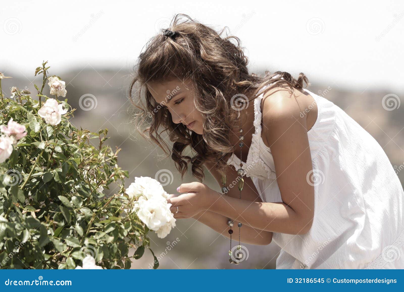 A Girl Looking at a Flower. Stock Image Image of model, lovely 32186545