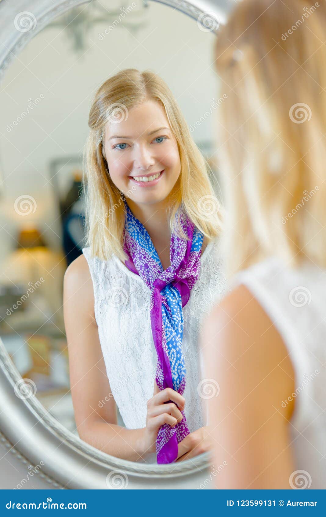 Girl looking in mirror stock image. Image of pretty 123599131