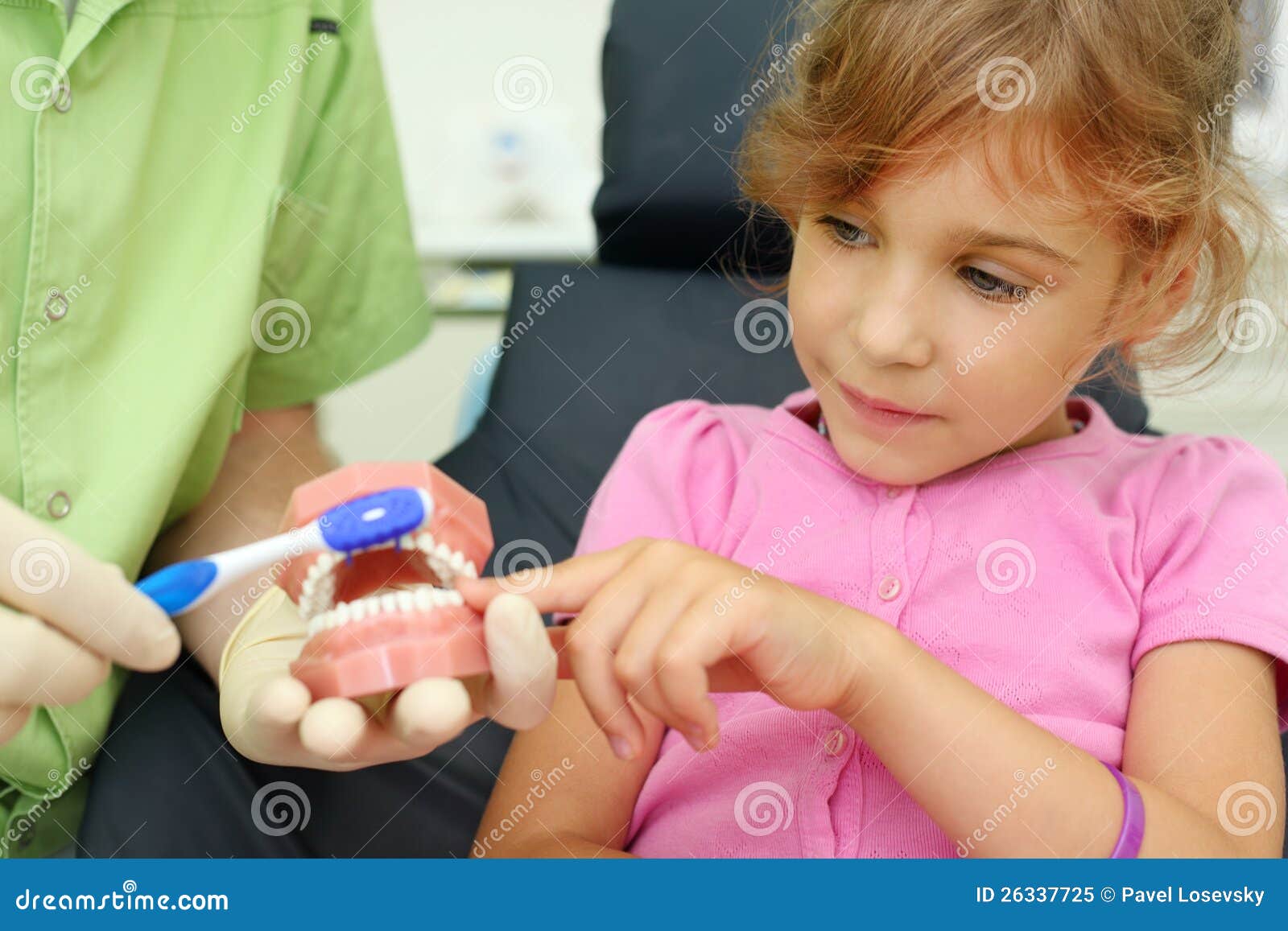 Girl Looks How To Correctly Brush Teeth Stock Image I