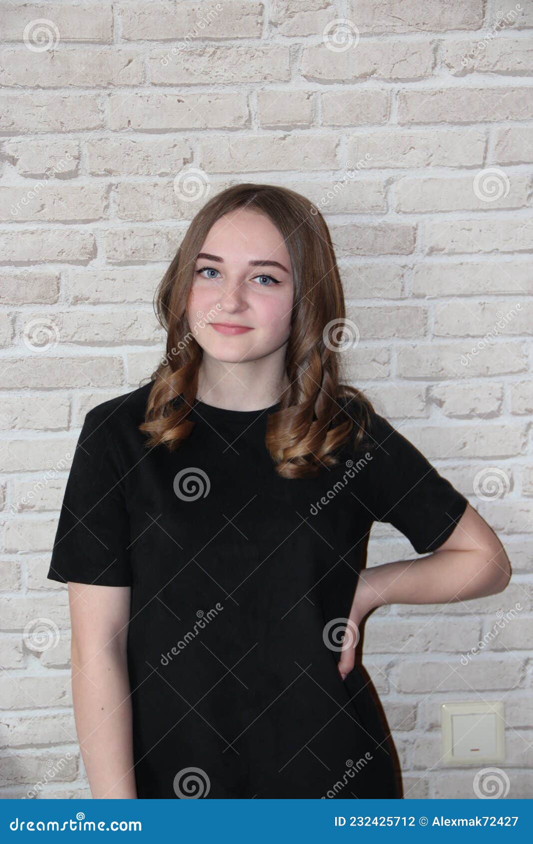 Girl with Lush Hairstyle Posing on Brick Wall Background. Girl in Black  Dress Stock Photo - Image of brick, child: 232425712