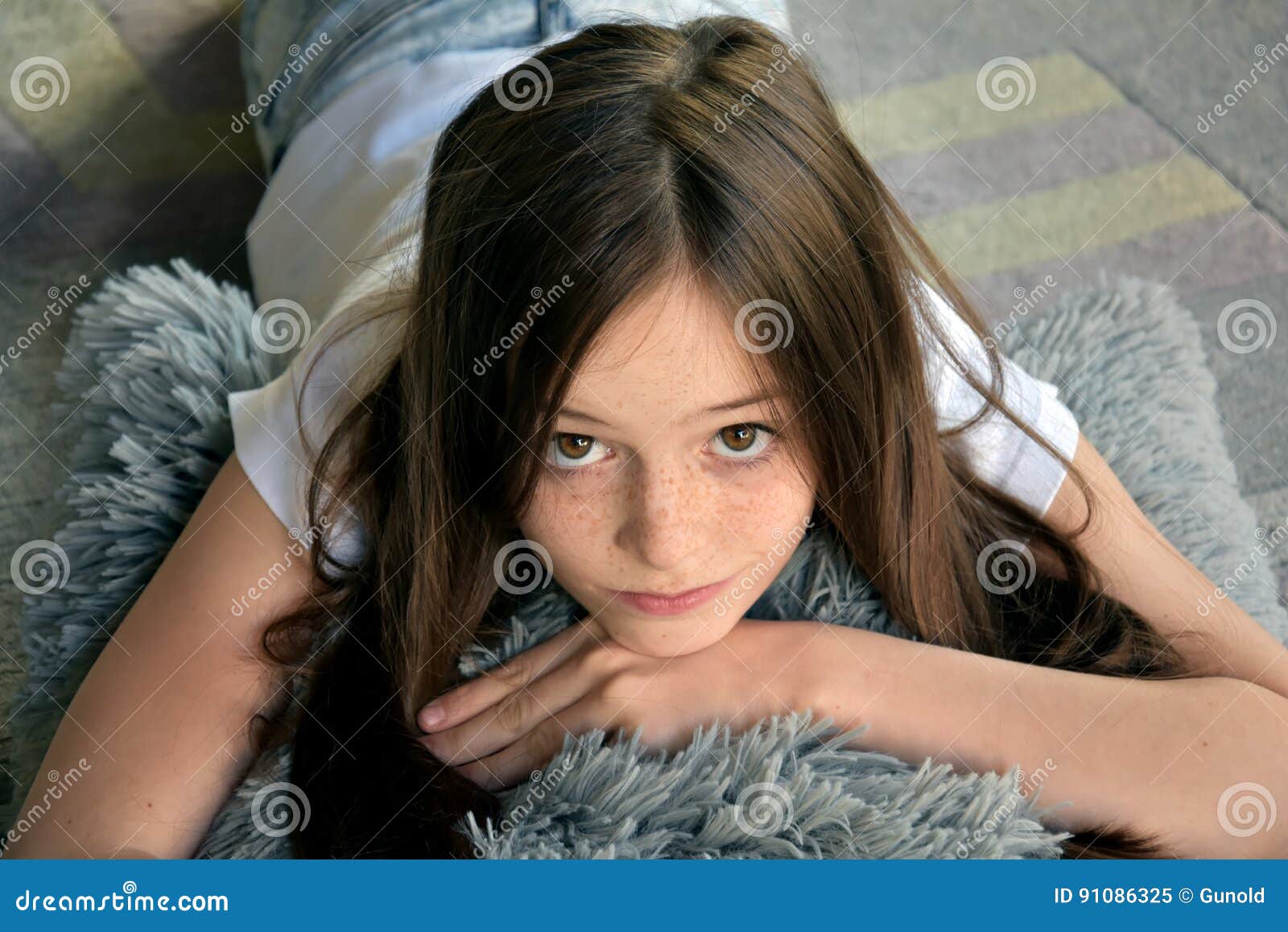 girl is lying on the floor