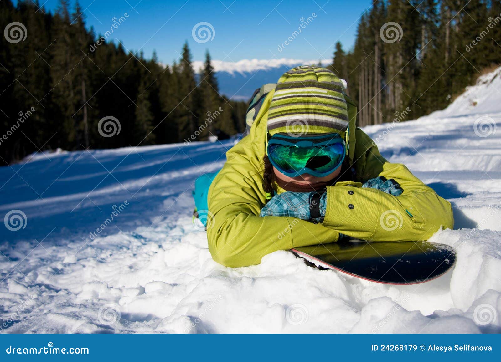 Girl lying on snowboard stock image. Image of tired, sunlight - 24268179