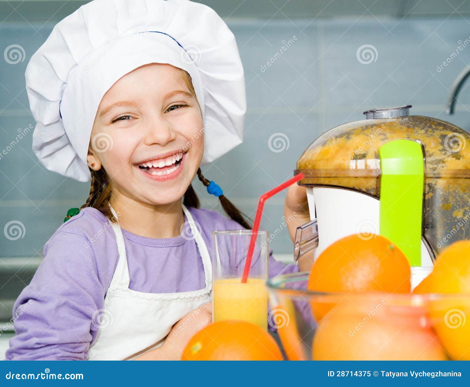 Girl making fresh juice stock image. Image of juicer 28714375