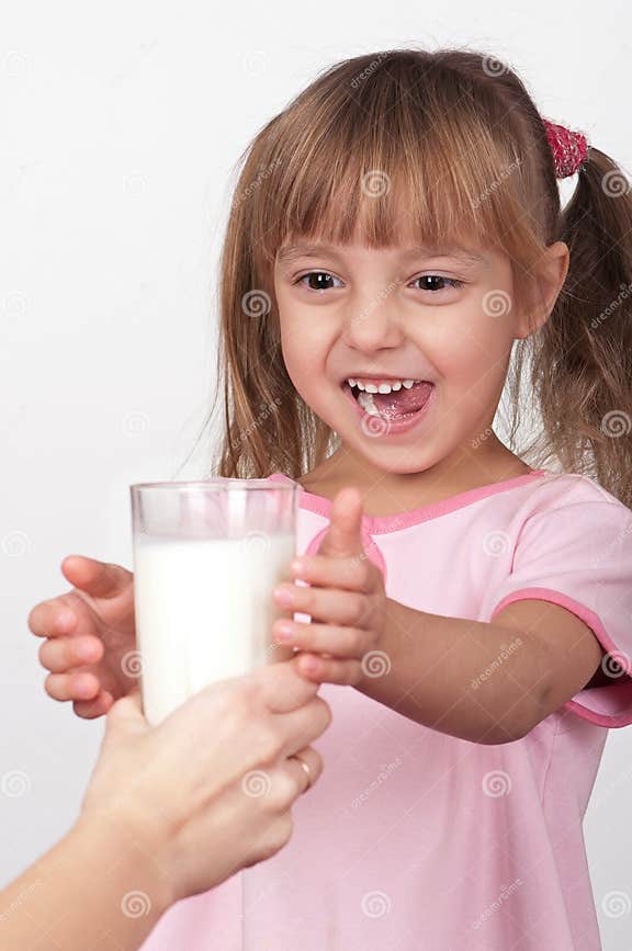 Girl with milk stock image. Image of looking, cheerful 18654499