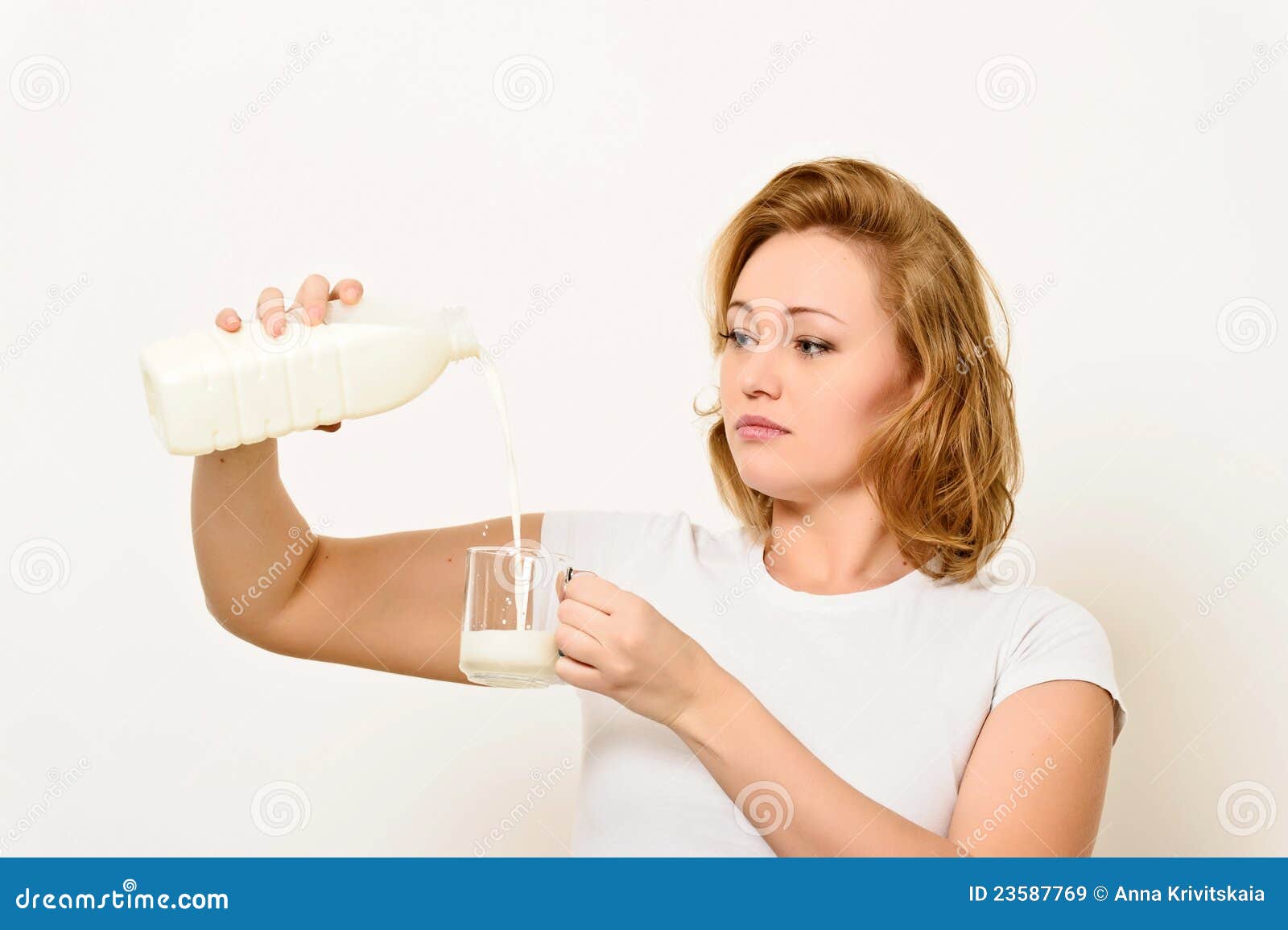 Girl with a milk bottle stock image. Image of beverage 23587769