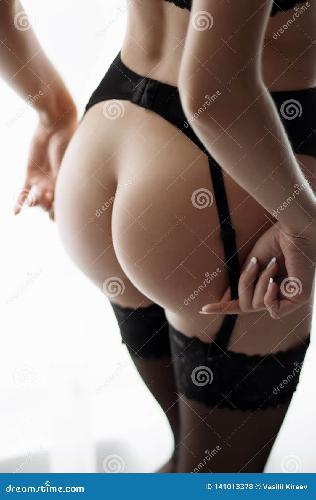 Girl with a Naked in a Corset Stock Photo - Image of buttocks, model:  141013378