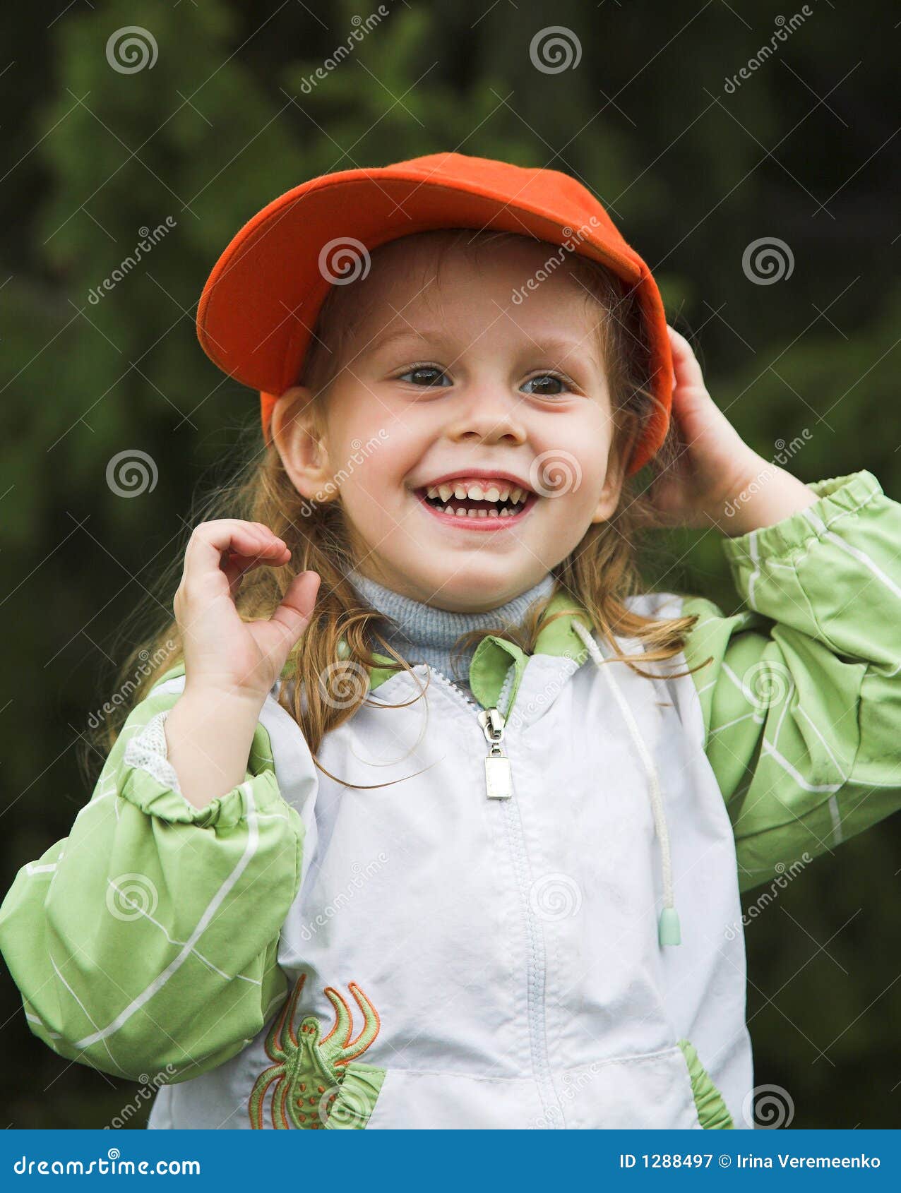 Girl in orange cap stock image. Image of enjoy, innocent 1288497