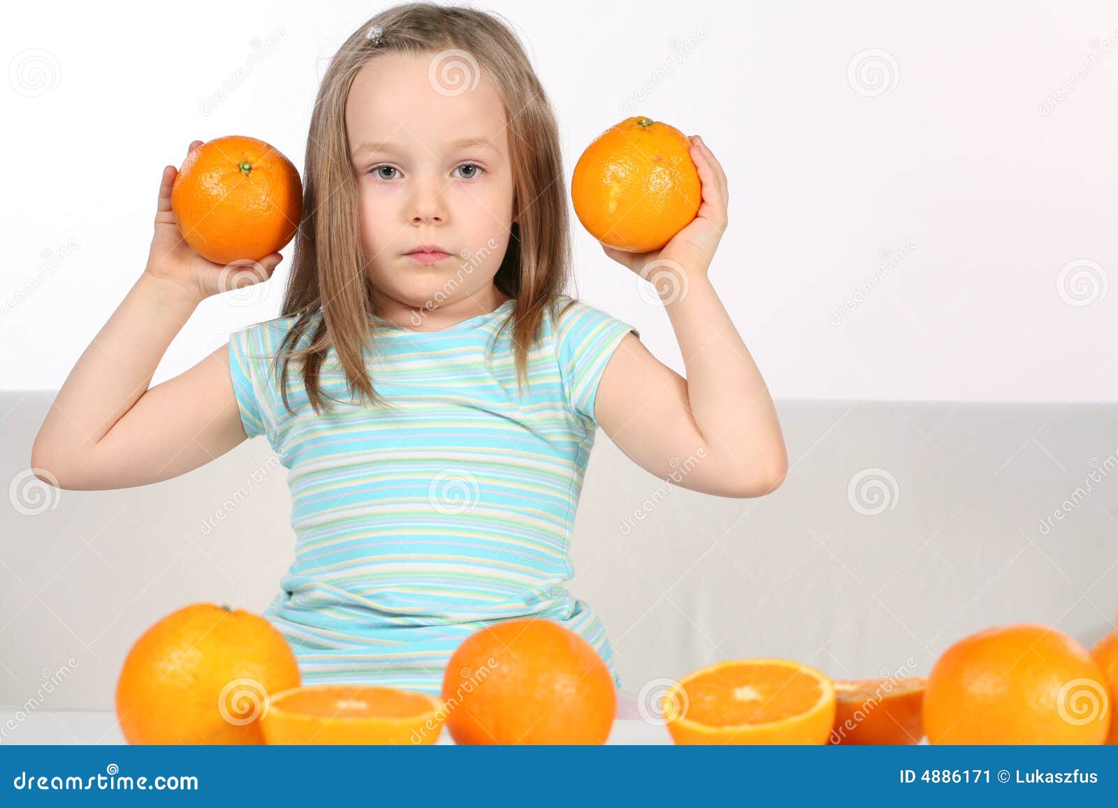 Girl with oranges stock image. Image of drinking, fruit 4886171